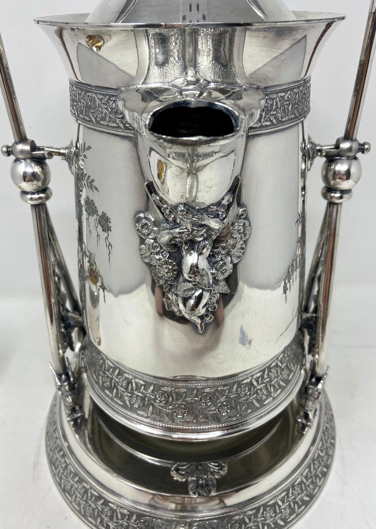 https://a.1stdibscdn.com/antique-american-meriden-silver-company-tilting-water-pitcher-w-cup-c-1870-for-sale-picture-6/f_8619/f_281443221649359903948/IMG_2367_master.jpg?width=768