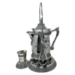 Antique American "Meriden Silver Company, " Tilting Water Pitcher w/ Cup, c. 1870