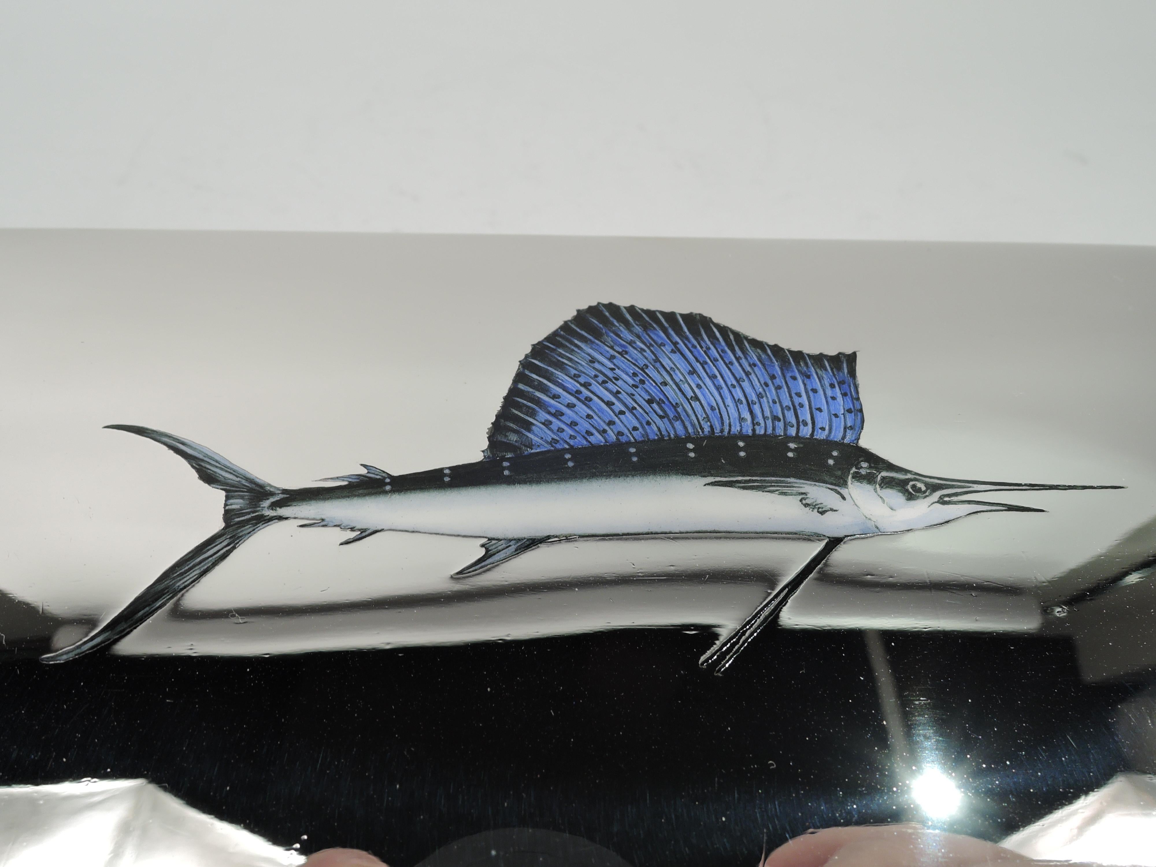 Modern sterling silver box. Made by Ahrendt & Kautzman in Newark, ca 1910. Rectangular with straight sides. Cover hinged and raised with overhanging rim. On cover top is an enameled swordfish. A realistic depiction with spotted blue dorsal fin and