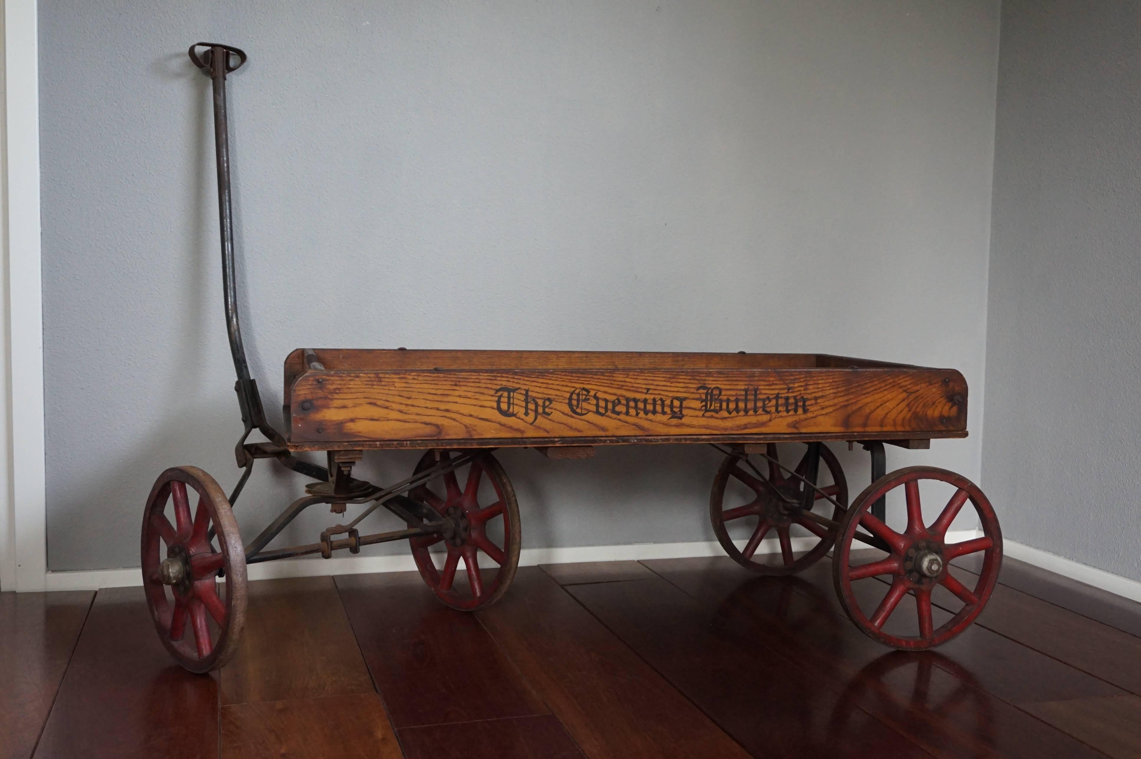 Amazingly authentic, American cart for distributing newspapers.

This could very well be this weeks best antique for interior designers in the Anglo American world. This is a real antique American cart that was used by newspaper boys in the