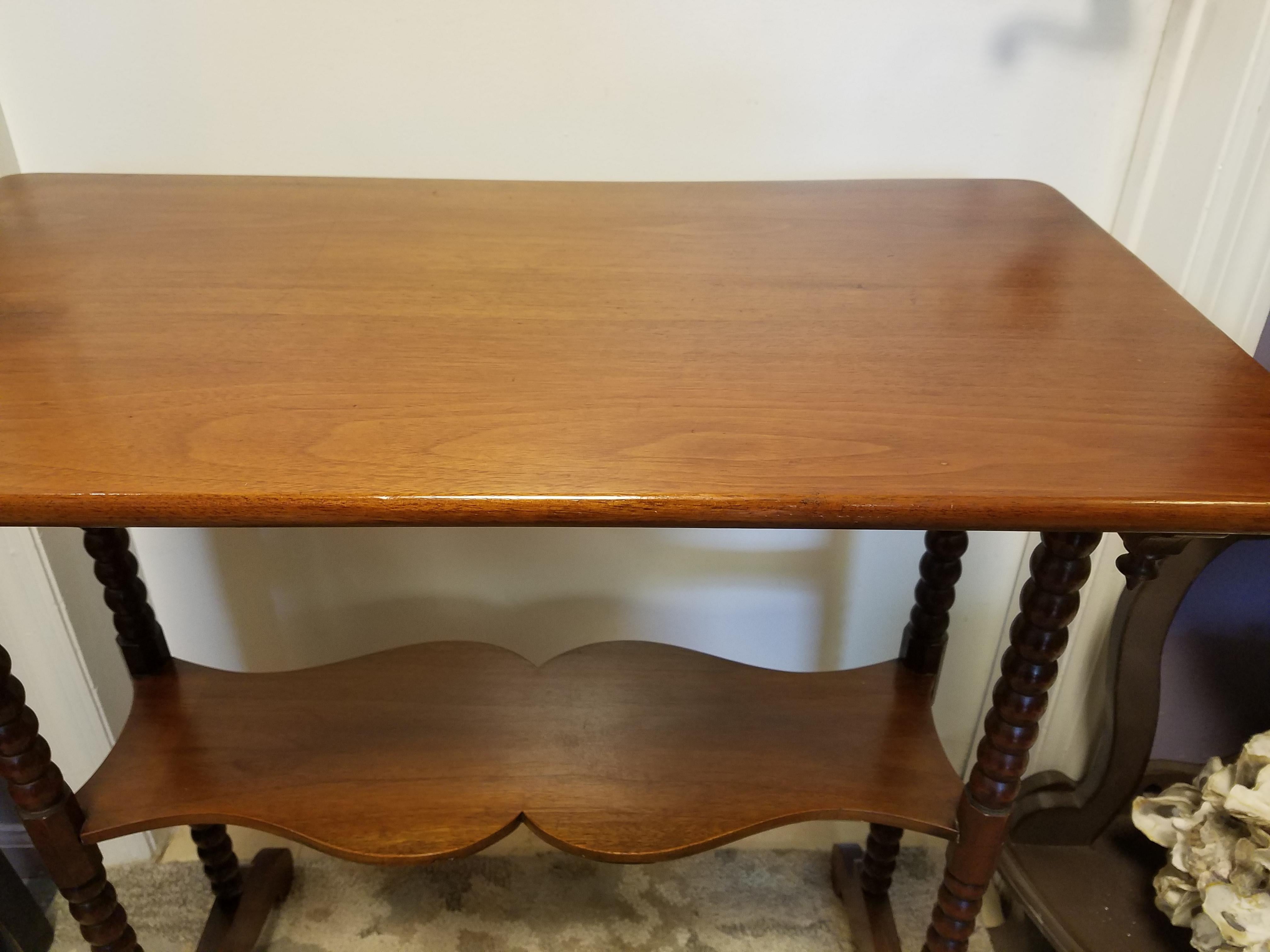 Antique American maple accent table. Handmade with beautiful turned legs and bottom support in a repeating ball design. Interesting carved apron on both ends. Please see all photos for details. No chips or cracks in the wood, a few surface scratches