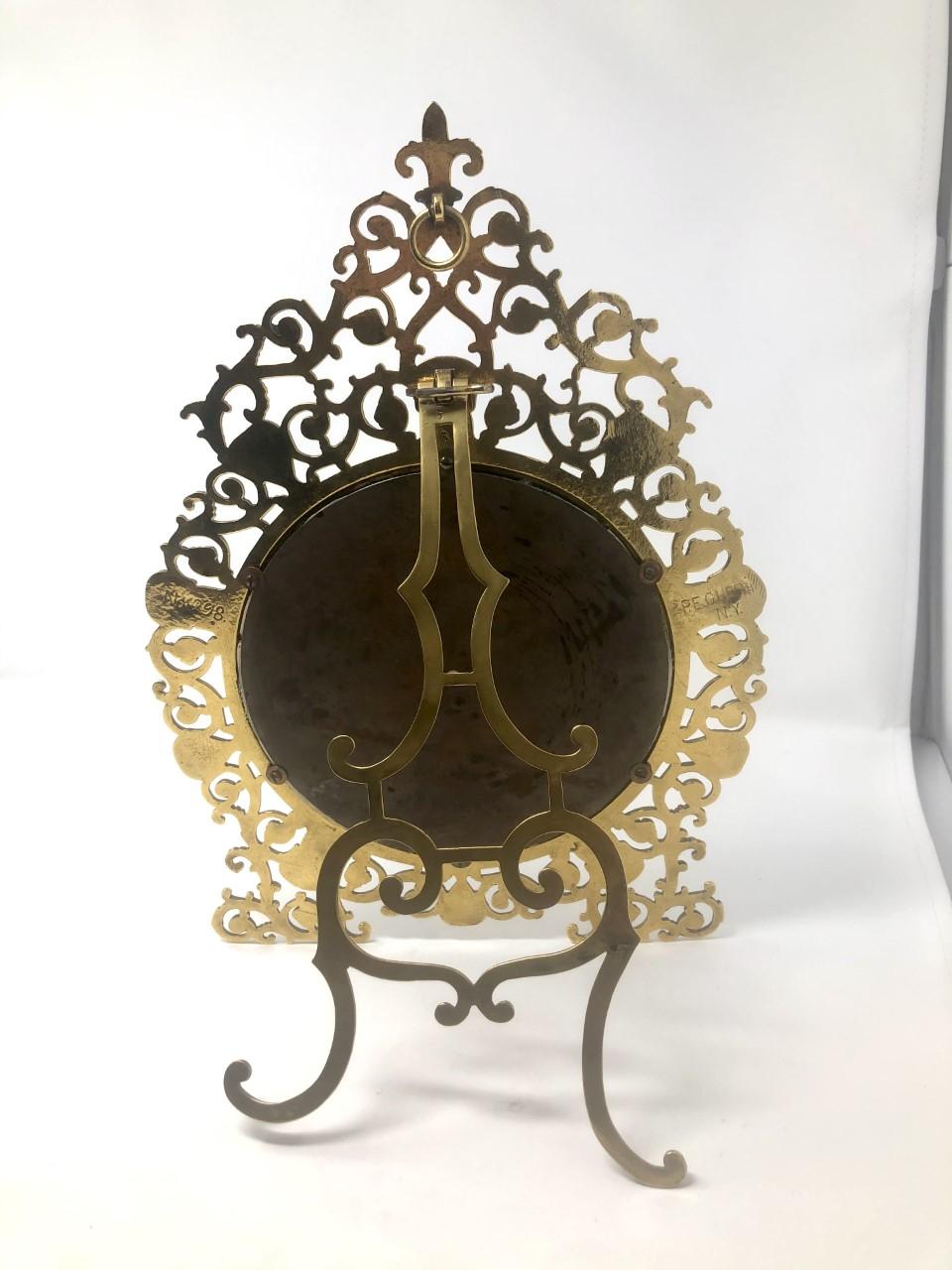 Large antique American Rococo-style with Fleur-de-Lis at top pierced brass picture frame by famous metal foundry 