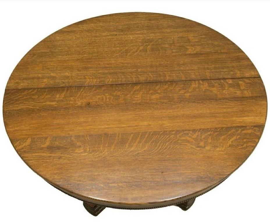 20ième siècle Ancienne table de salle à manger à rallonge américaine à piédestal sculpté et figuratif en vente