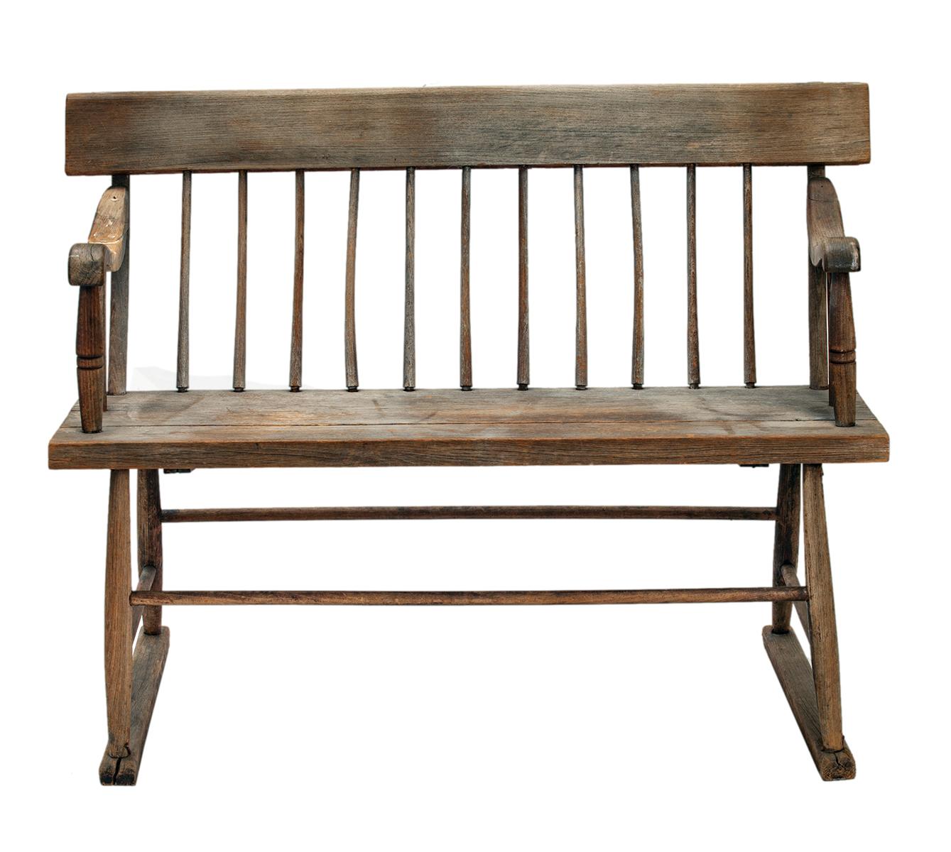 Rustic Americana, a bench with spindle back. A seat comfortable for two adults. The arms are gracefully curved and placed just where it’s needed, 27” from the floor.