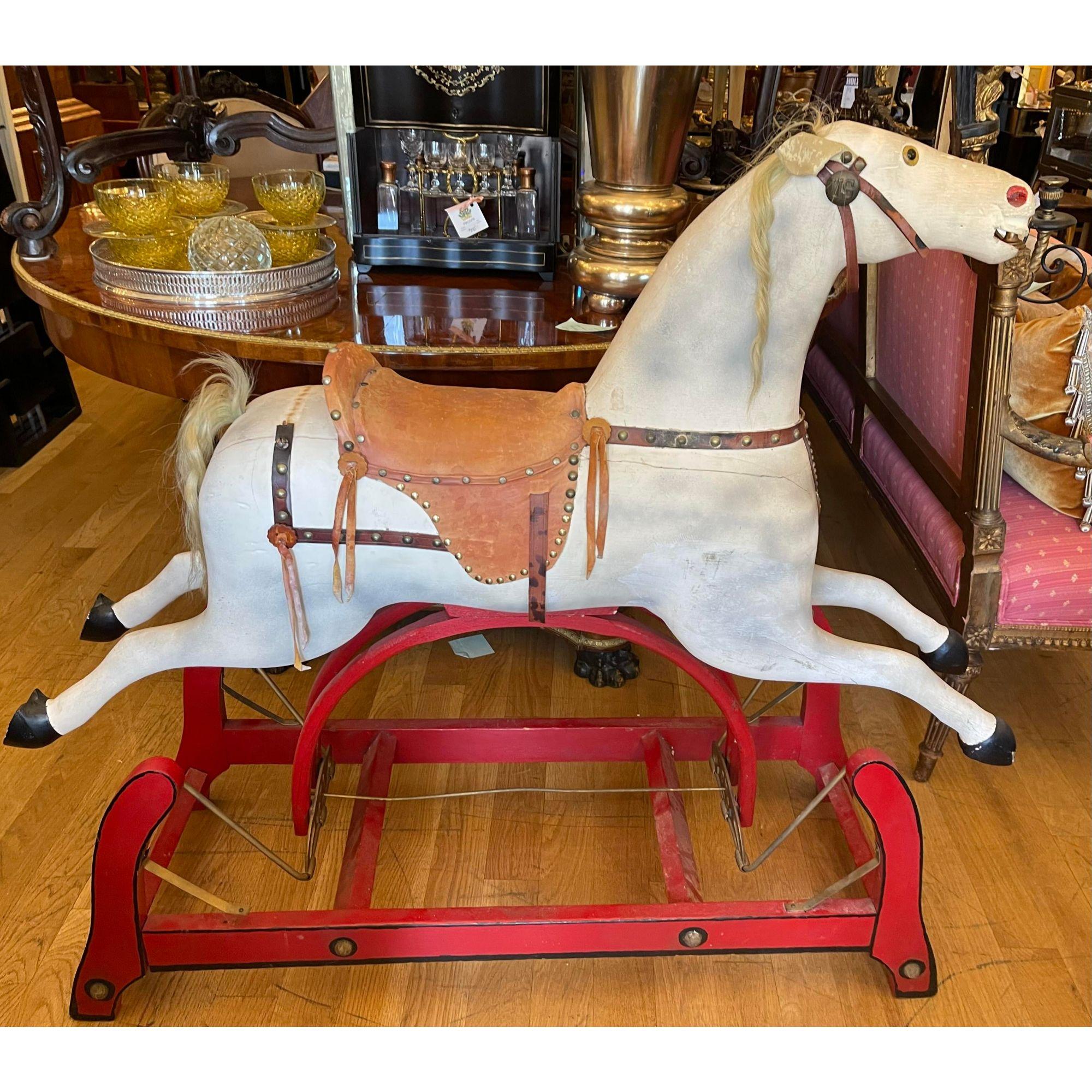 Antique American primitive handmade gliding rocking hobby horse

Additional information: 
Materials: Iron, Leather, Wood
Color: Antique White
Period: 19th Century
Styles: American
Item Type: Vintage, Antique or Pre-owned
Dimensions: 44.5