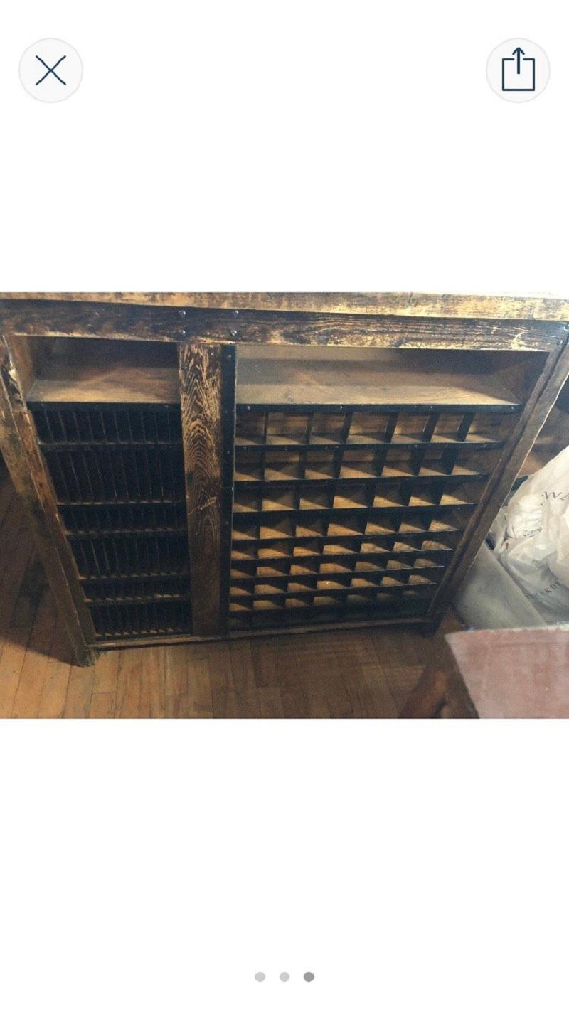 Antique American printer wood cabinet with original marble top.
