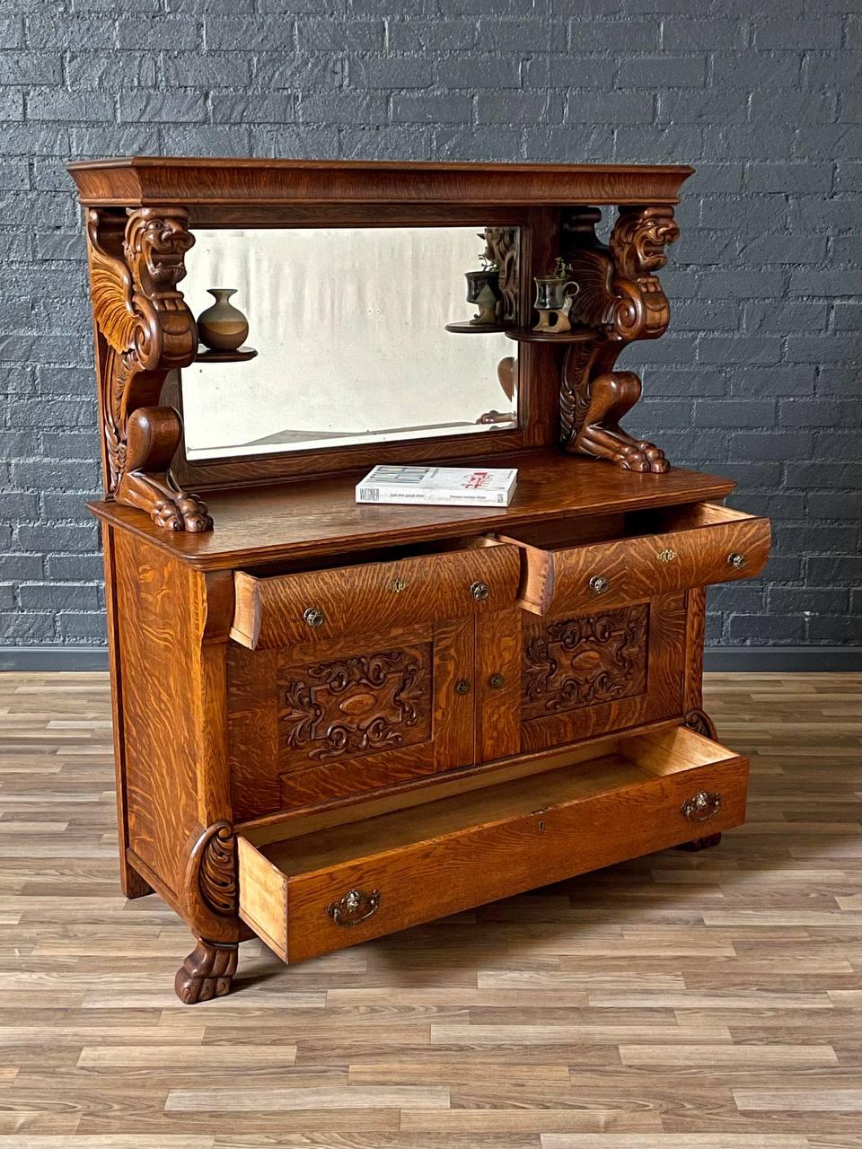 Renaissance Revival Antique American Quarter-Sawn Oak Sideboard w/ Winged Griffin Carvings For Sale