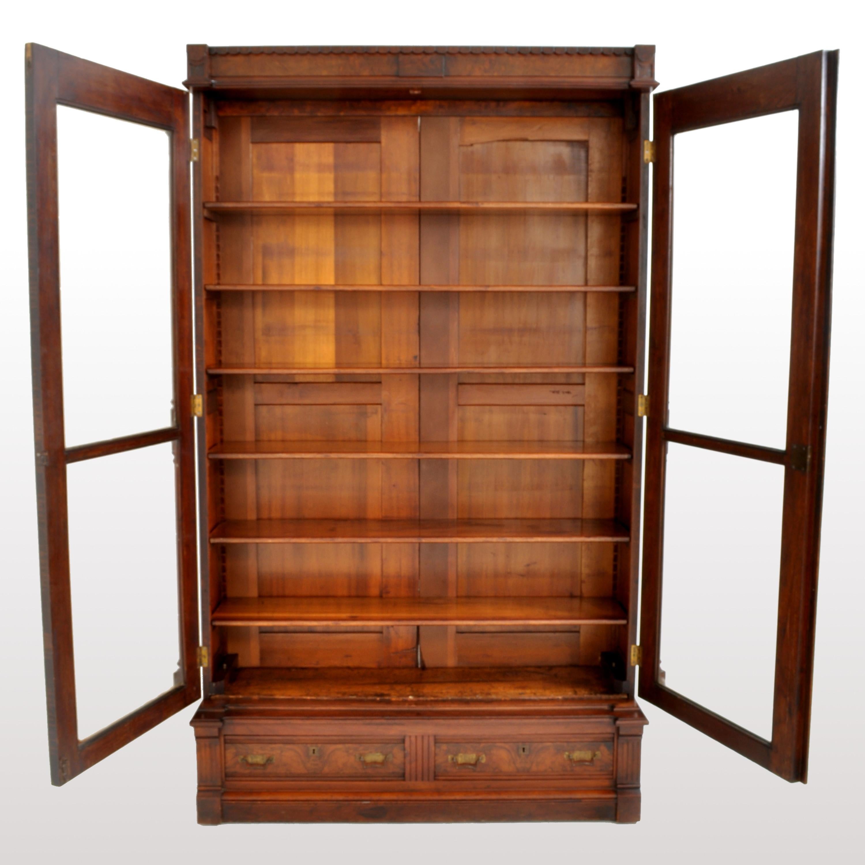 Antique American Renaissance Revival Eastlake Carved Walnut Tall Bookcase, 1875 In Good Condition In Portland, OR
