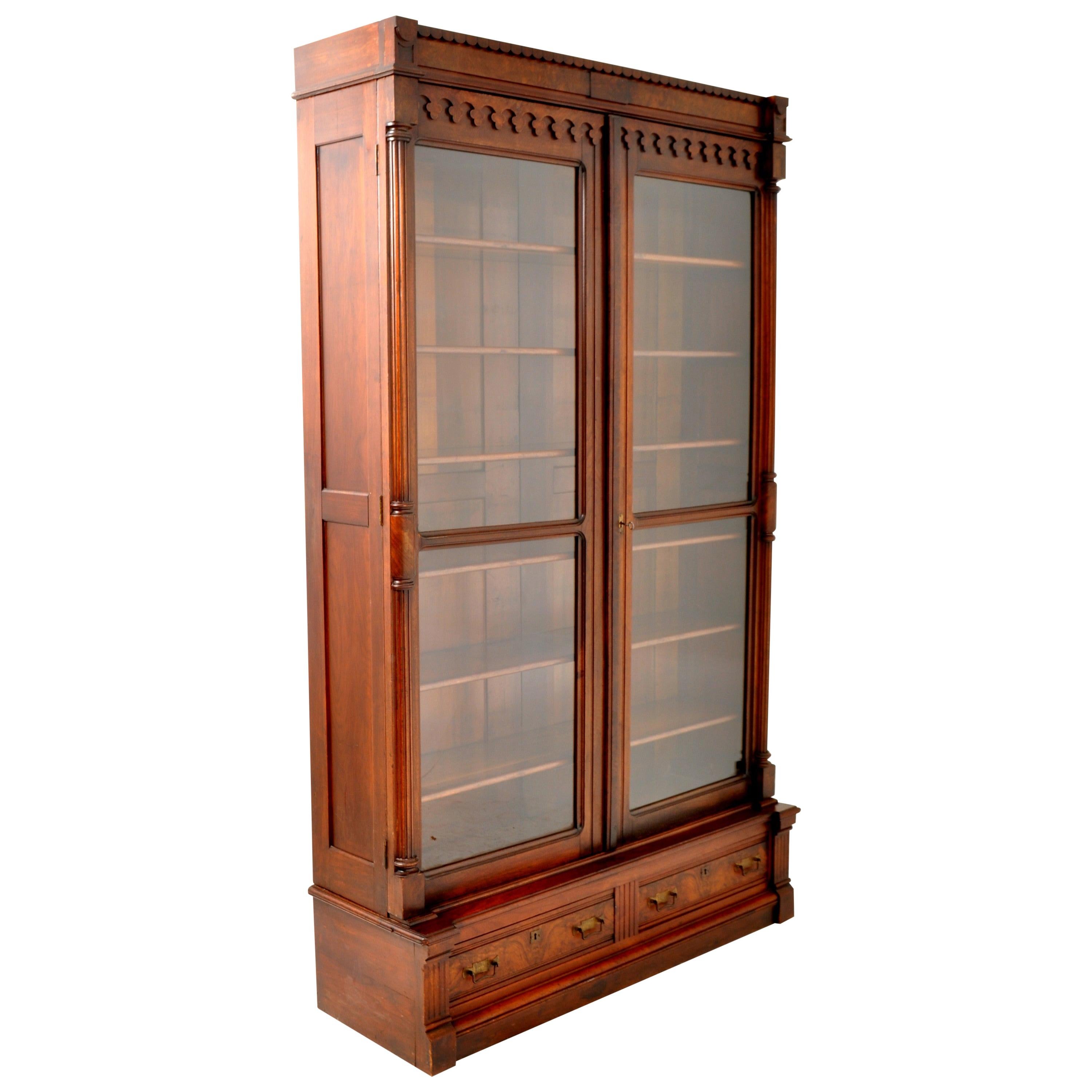 Antique American Renaissance Revival Eastlake Carved Walnut Tall Bookcase, 1875