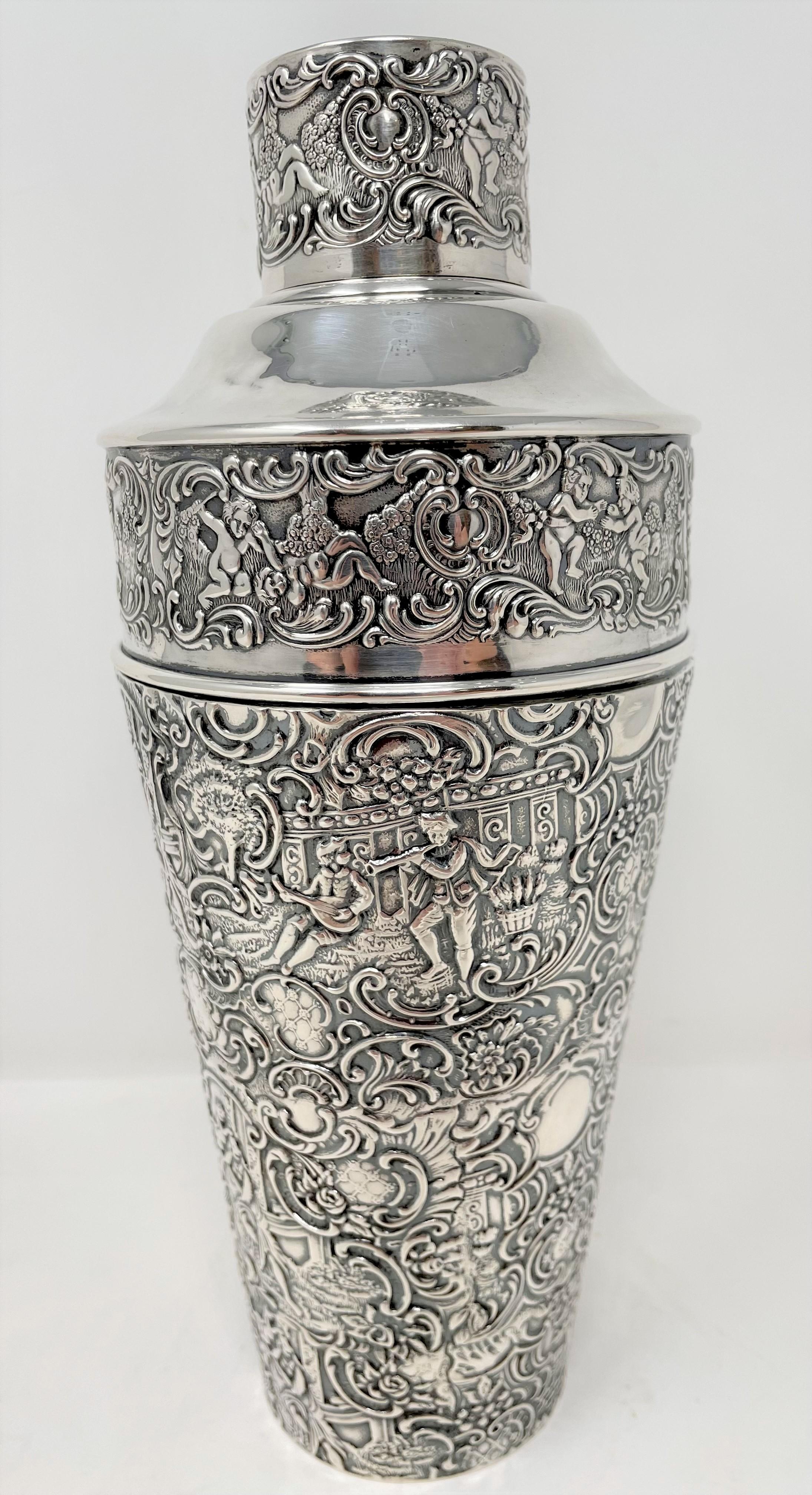 Antique American repousse sterling silver cocktail shaker, Circa 1920's.