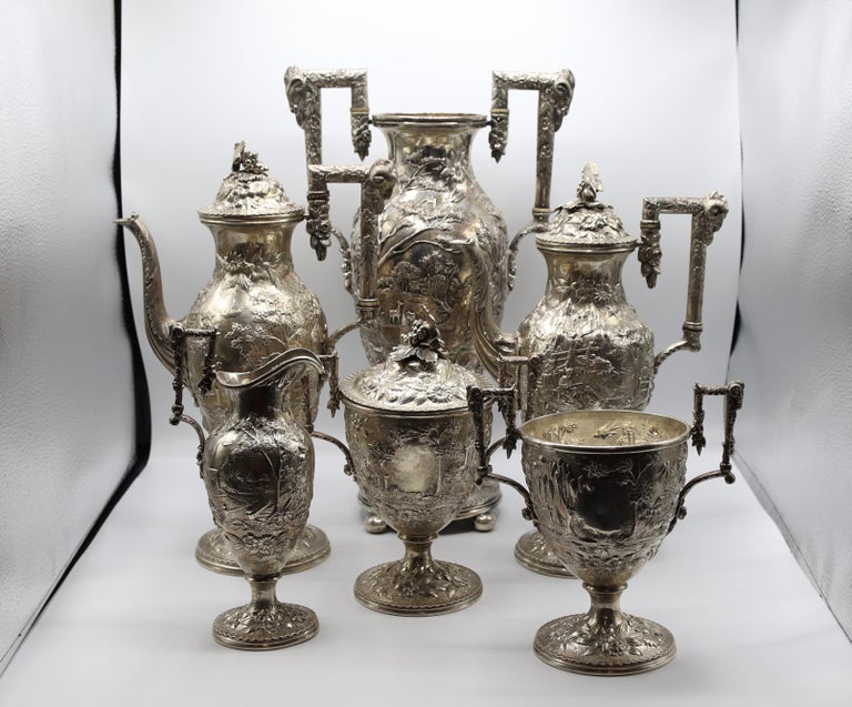 Antique American Samuel Kirk & Son Co. Sterling Repoussé Tea & Coffee Service 6 Piece Set. Scenic landscape pattern of castles, ram heads, deer, other animals & birds, boats, bridges, rivers, fountains, boy and a dog, people, houses, flowers and