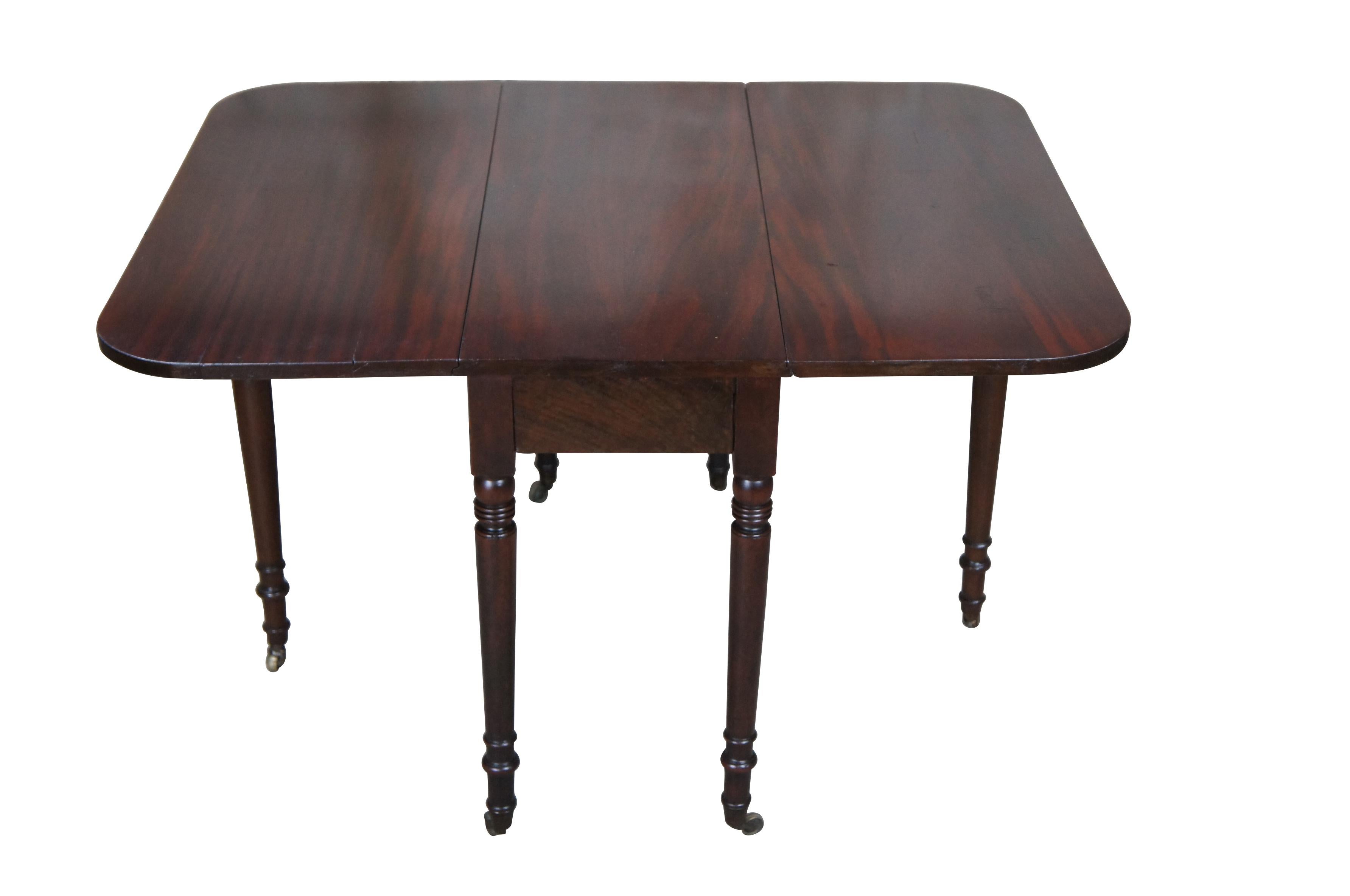 Charming early 19th century Sheraton gateleg table.  Made from mahogany with two 