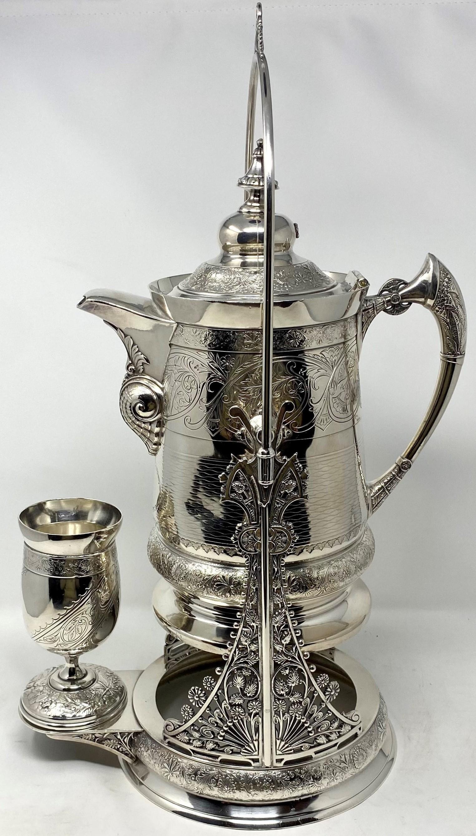 Antique American quadruple silver plated tilting water pitcher on stand with cup, circa 1870s.
Signed 