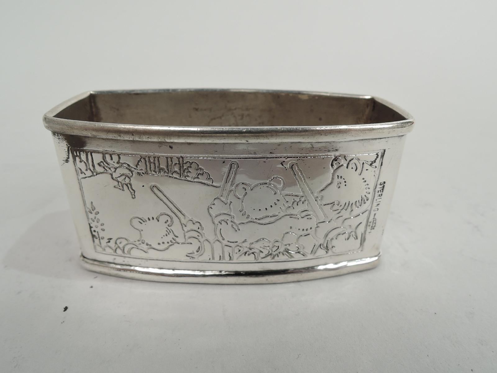Edwardian sterling silver napkin ring. Made by Webster in North Attleboro, Mass., ca 1910. Curved front and back and flat ends. Acid-etched scenes from Goldilocks and the Three Bears: On front Mama Bear and Papa Bear inspect the porridge bowls while