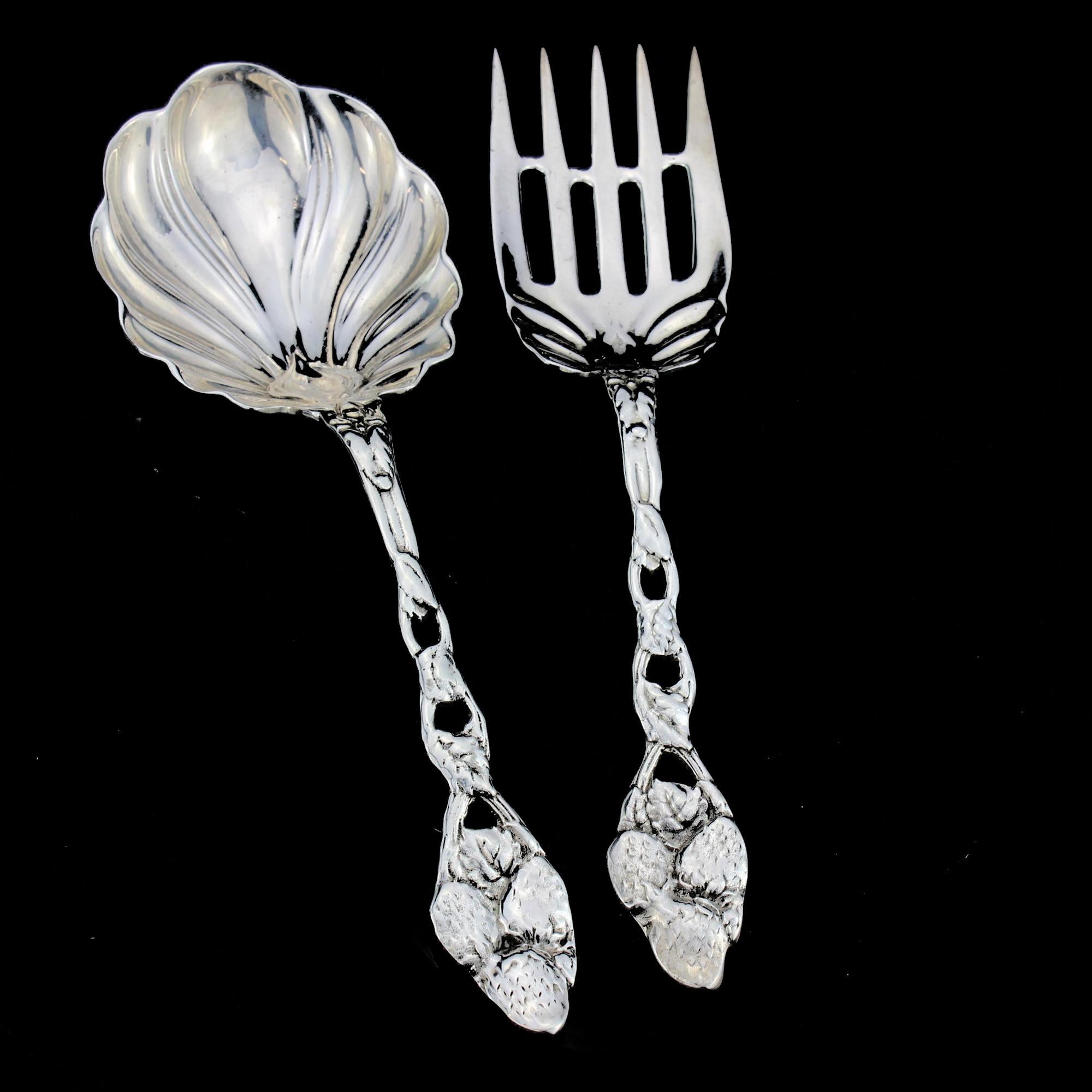 Antique American sterling silver pair of serving spoon and fork
Made in early 20th century
Hallmarked Sterling silver


Fork size: 23.5 x 5.4 x 2 cm
Spoon size: 23.5 x 7.9 x 3 cm
Total weight: 236 grams.
  