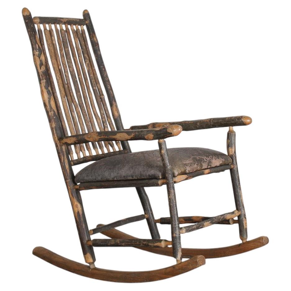 Antique American Stick Back Rocking Chair with Distressed Leather Seat Patina For Sale