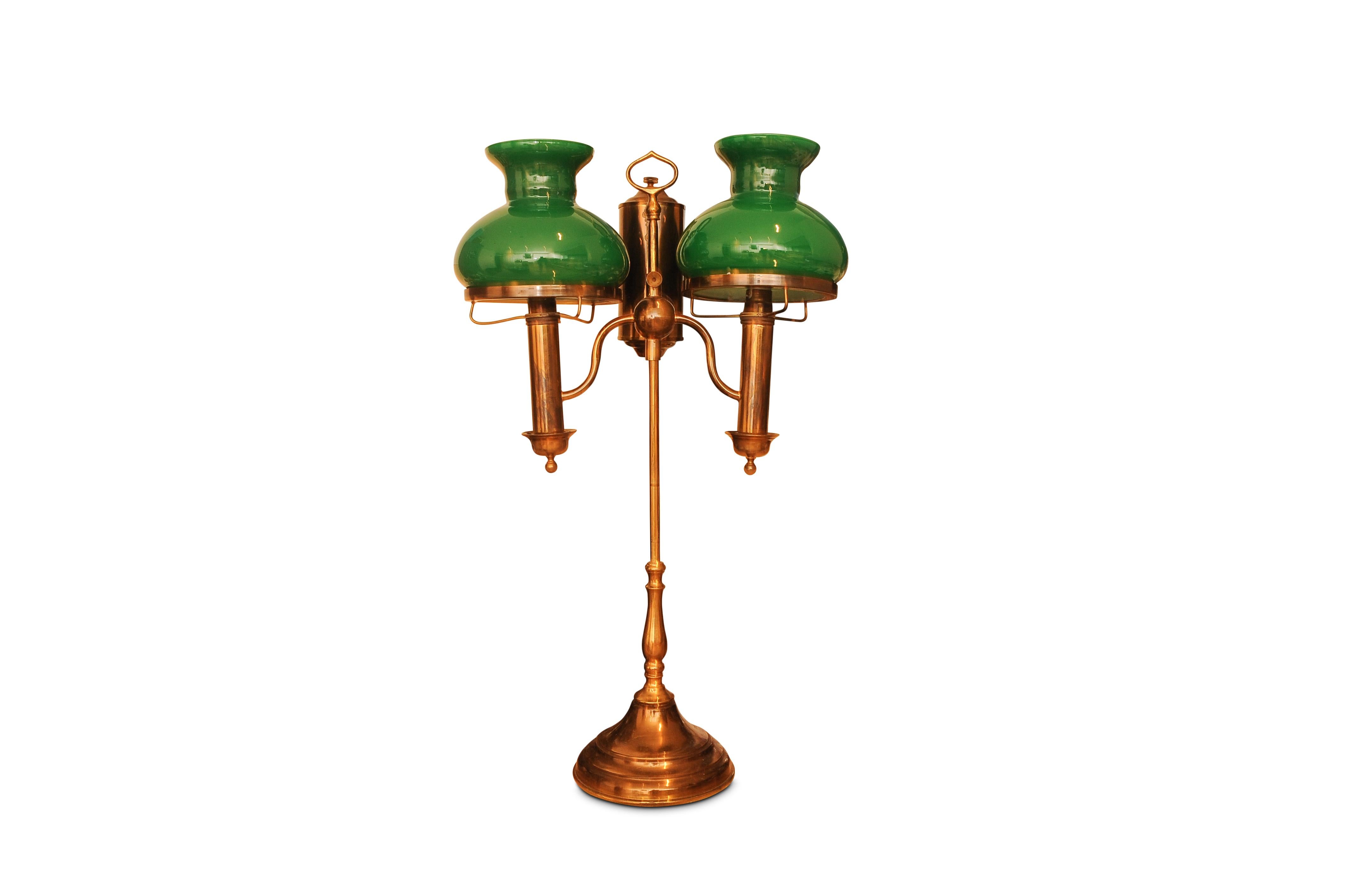 Antique American Student Converted Twin Oil Lamp By Bradley & Hubbard 1800's 

The Bradley & Hubbard Manufacturing Company (1852–1940) was formed in Meriden, Connecticut, and over the years produced Art Brass tables, call bells, candlestick holders,