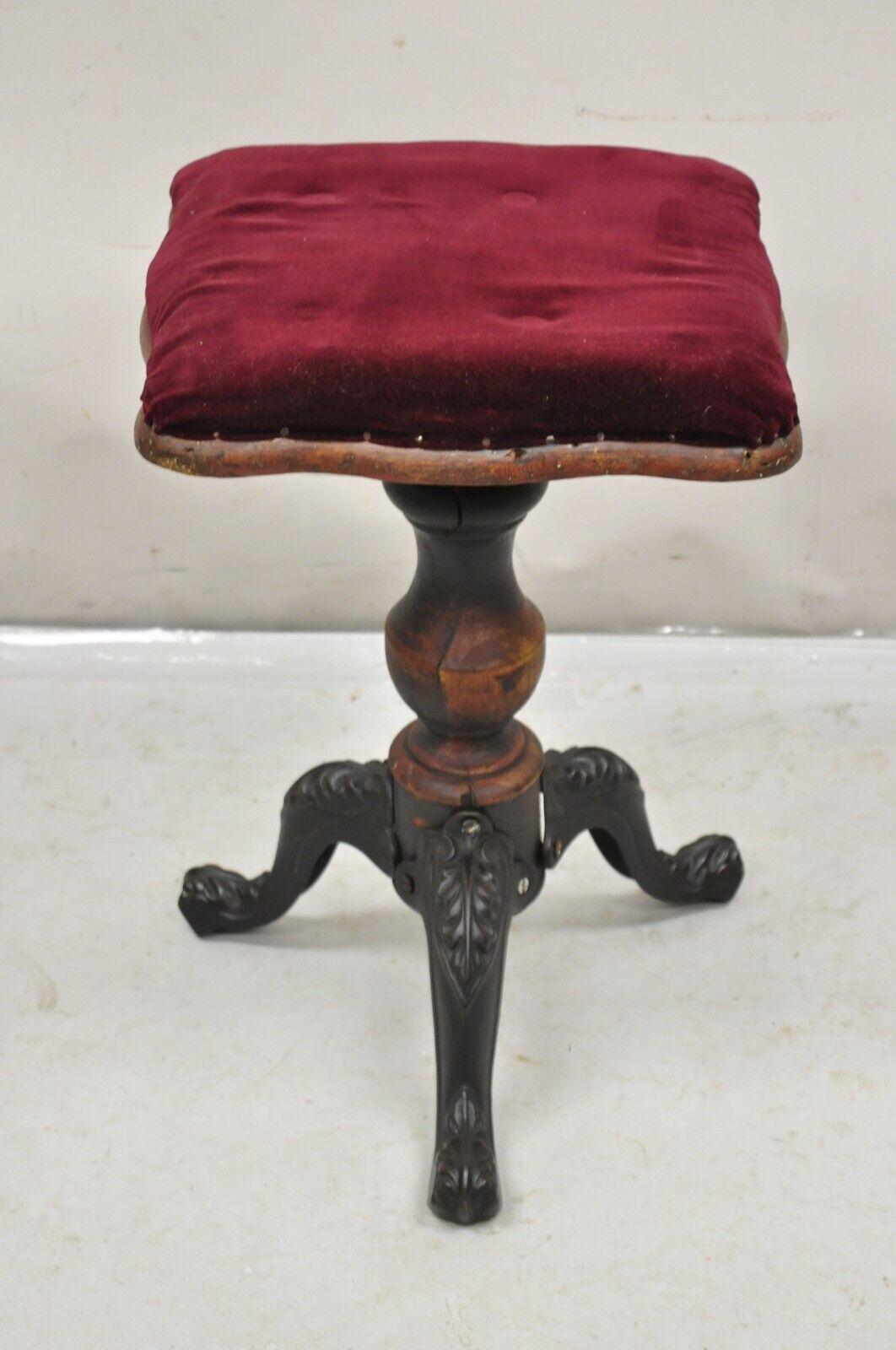 Antique American Victorian Cast Iron and Wood Tripod Pedestal Adjustable Stool. Circa 1900. Measurements:19.5-23