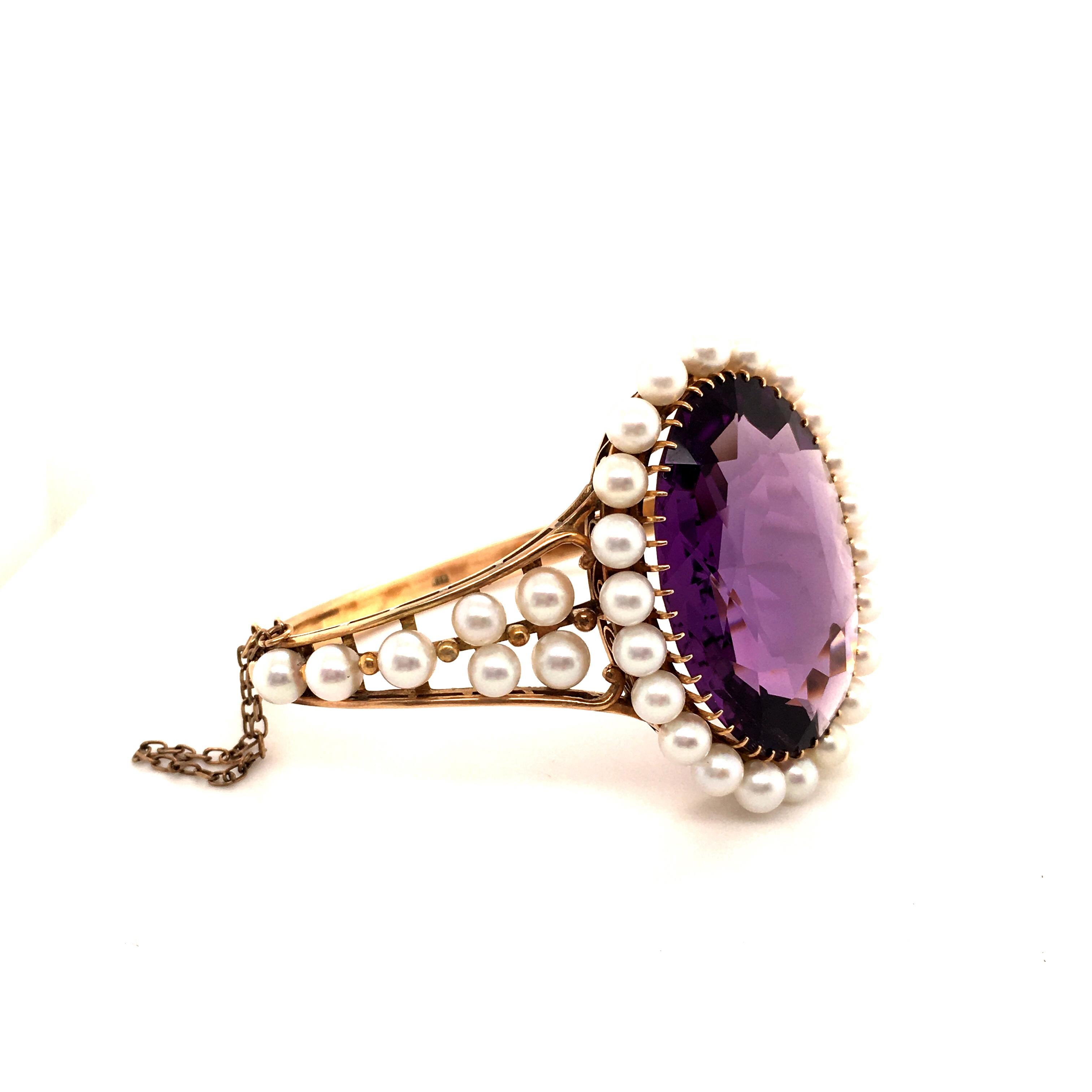 Oval Cut Antique Amethyst and Pearl Bangle in 18 Karat Gold
