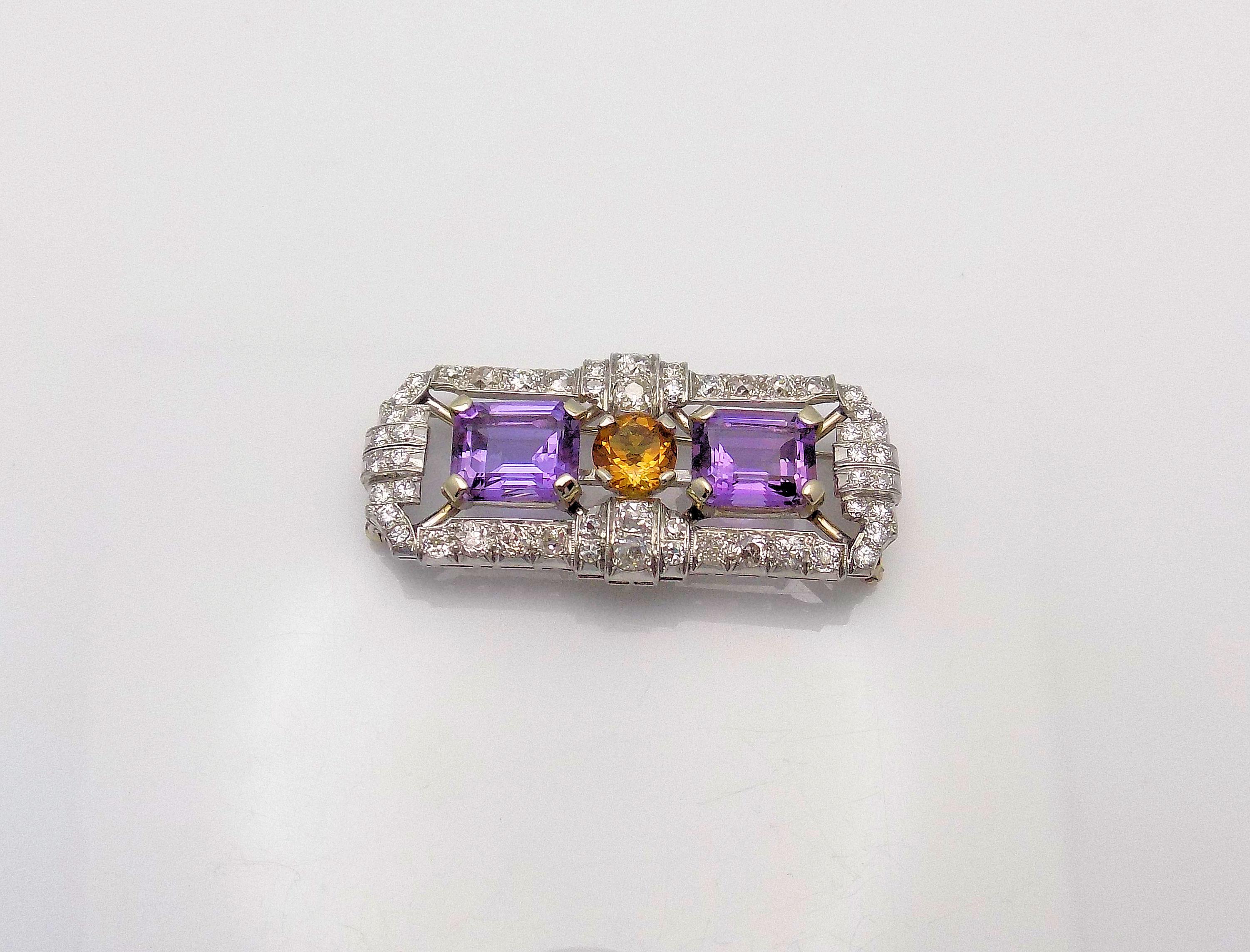 Stunning Platinum Antique Brooch, 52 Old Mine Cut, Round Brilliant Cut, Single Cut 3.00 Carat Total Weight, VS-SI, H-I. 2 Emerald Cut Amethyst 11.00 Carat Total Weight; 1 Round Citrine 2.00 Carat; 2