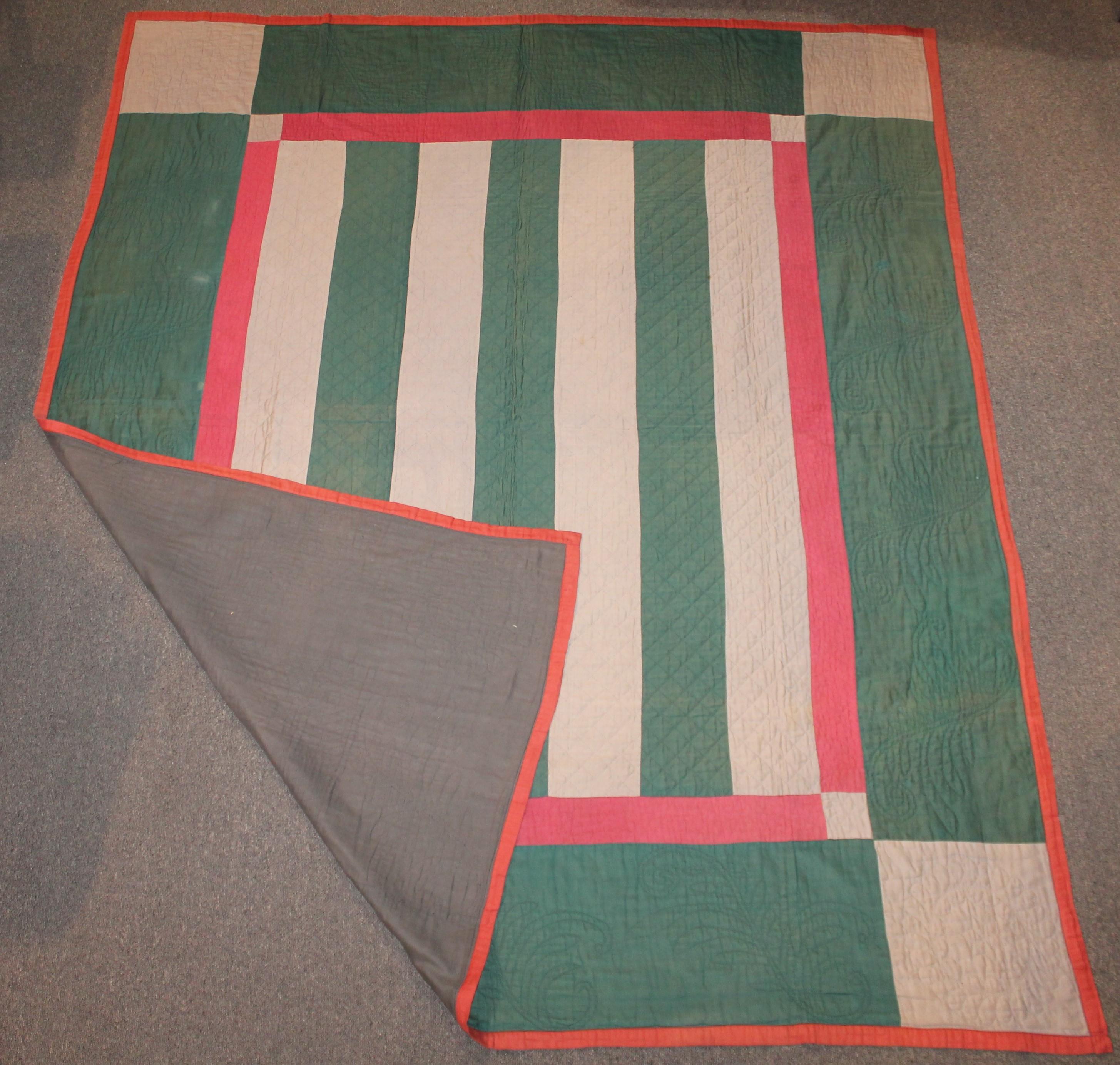 Antique Amish Bars quilt from Lancaster County, Pennsylvania. This quilt is from the 1930s wool and cotton sateen. The condition is very good with minor spots in area to be expected.