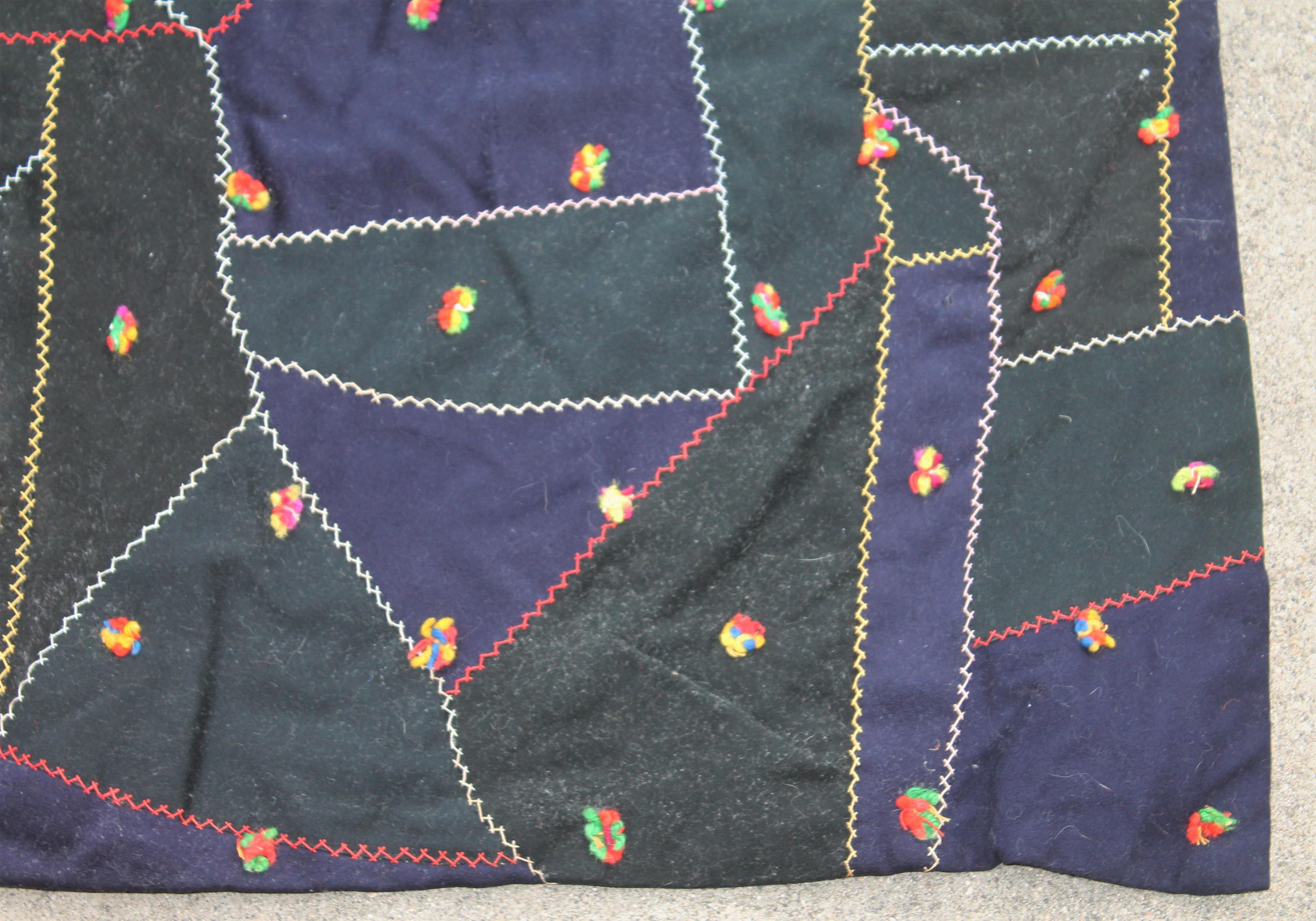 This antique Amish crazy quilt is signed AHS 1913 and dated 1913. This is from Lancaster County Pennsylvania. This hand sewn Amish wool lap quilt is hand sewn and signed and dated 1913 