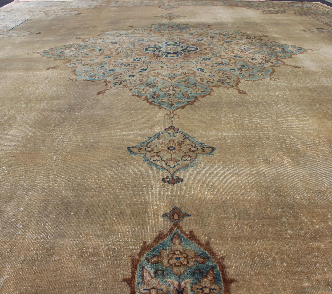 20th Century Antique Hand Knotted Amritsar Carpet in Taupe, Light Brown and Blue Accent's