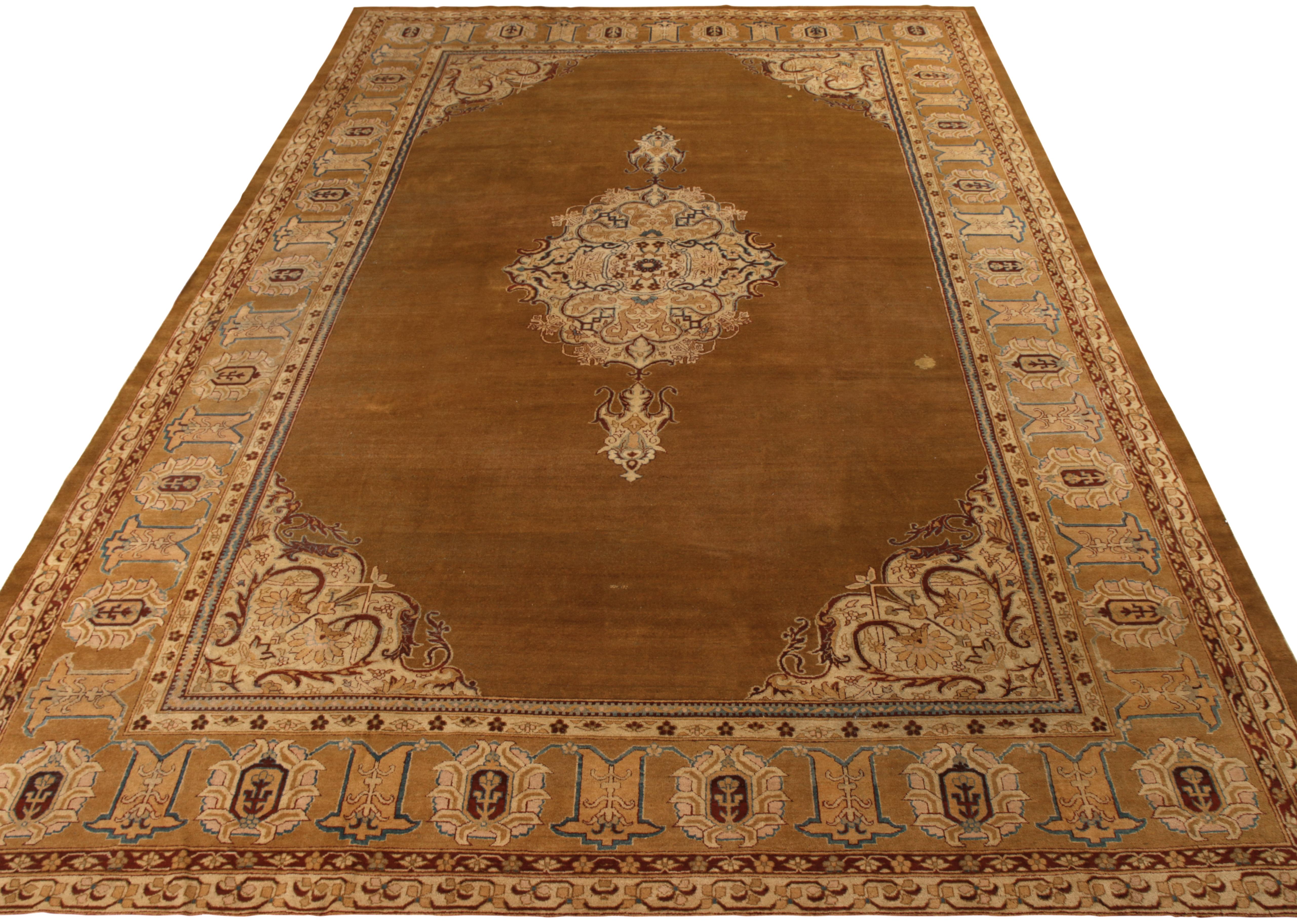 Hand knotted in wool circa 1920-1930, this antique 11x17 Amritsar rug is a particularly rare unveiling.

On the Design: 

This piece enjoys a play of open field and medallion styles—the former an uncommon trait in rugs of its provenance. Its