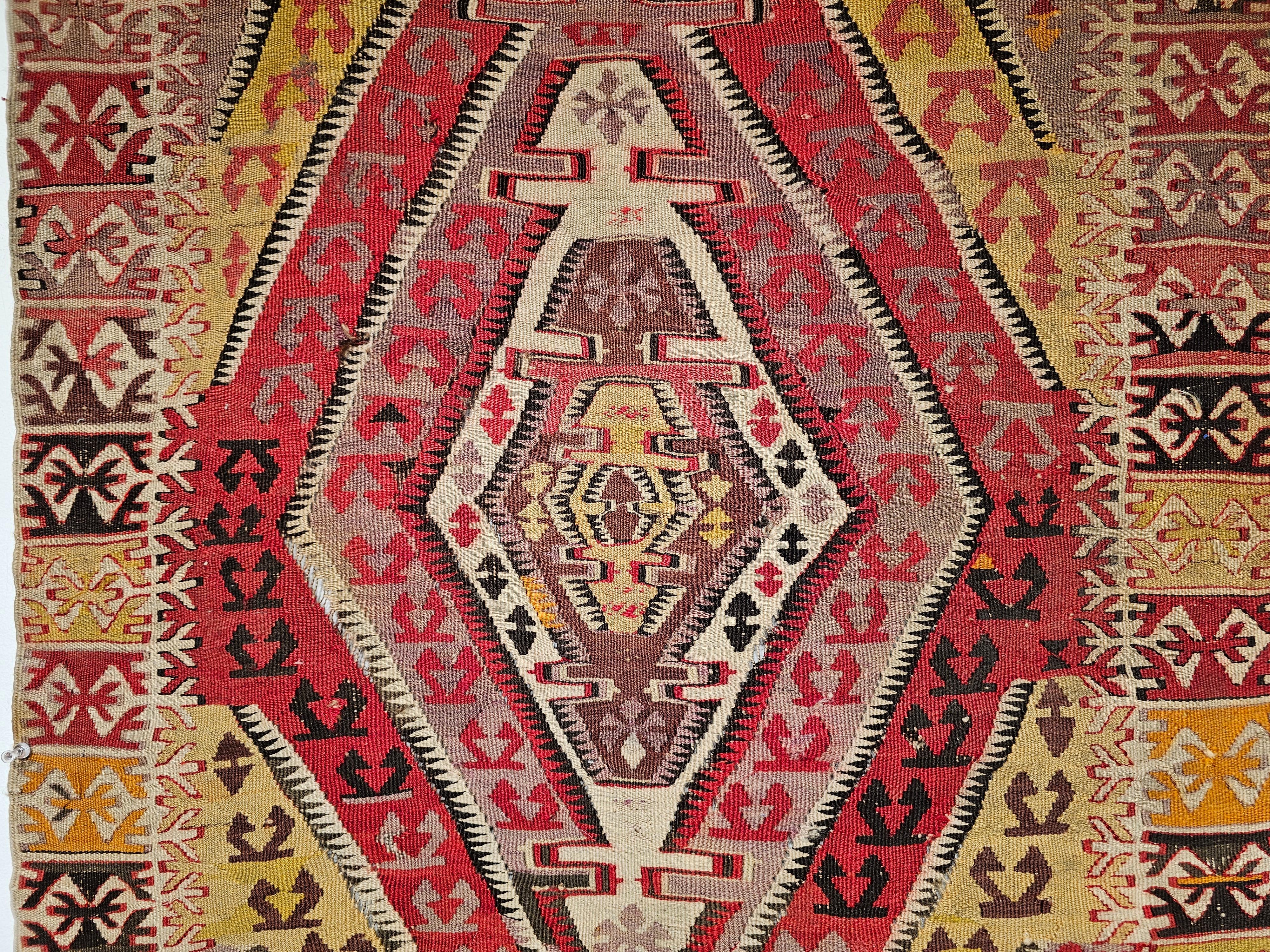 Wool 19th Century Anatolian Kilim Area Rug in Medallion Pattern in Red, Yellow, Brown For Sale