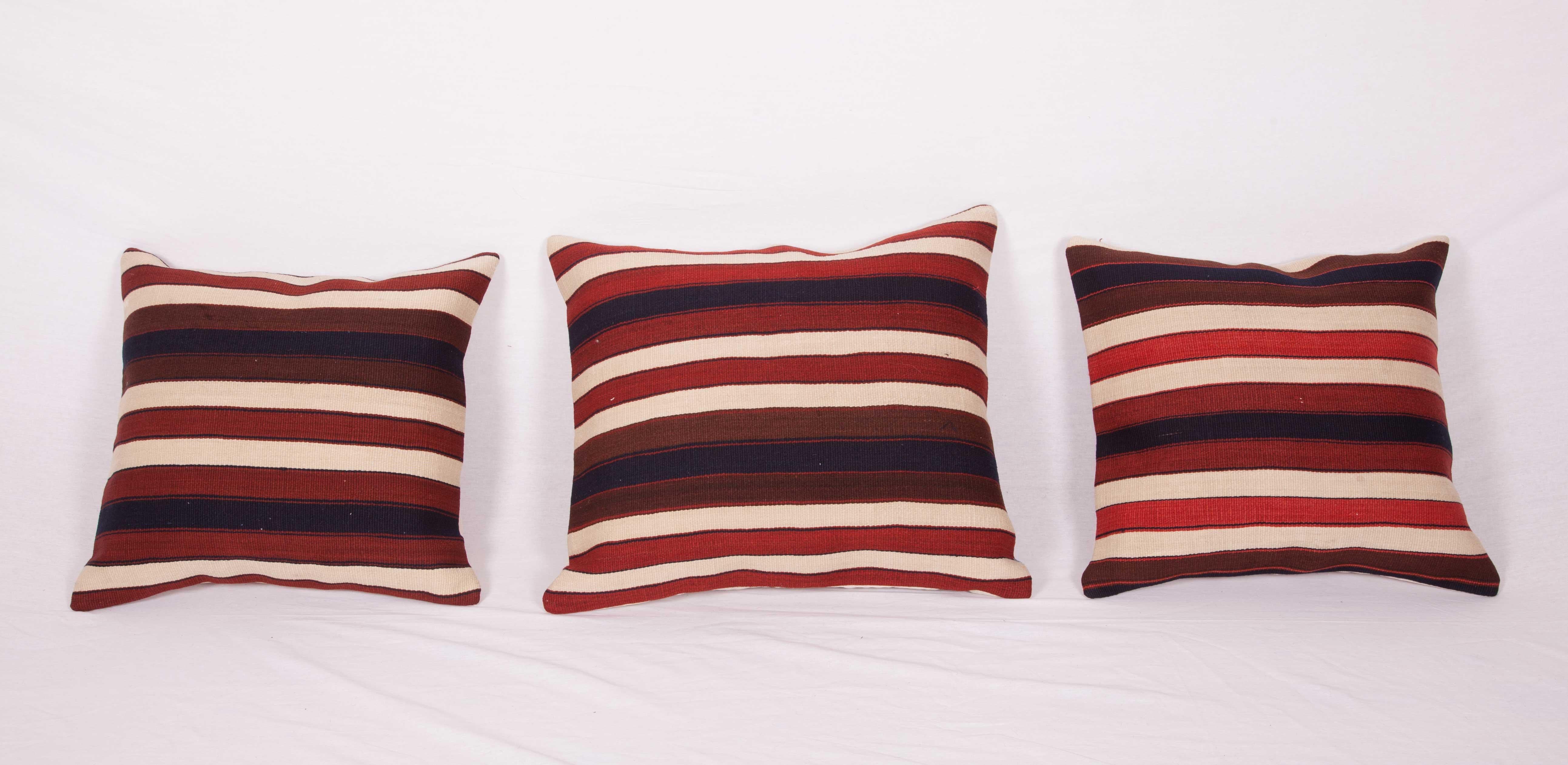 The pillow cases are made from an antique Anatolian Kilim. They do not come with inserts but come with bags made to the size and out of cotton to accommodate the filling. The backing is made of linen. Please note filling is not provided. Since the
