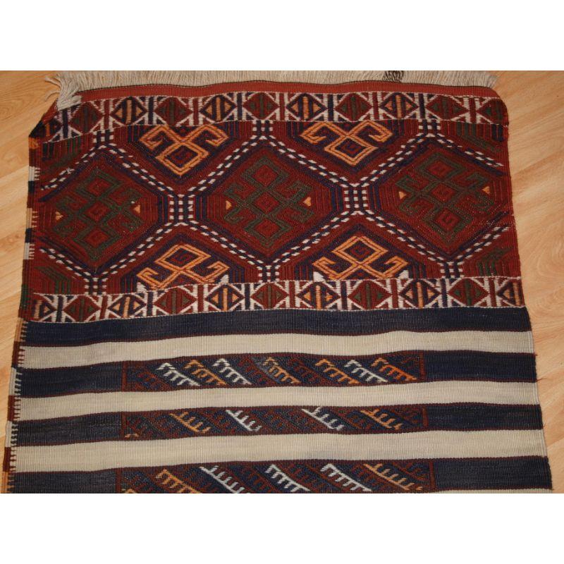 Antique Anatolian kilim runner from the Malayta region of Turkey.

Well drawn with excellent traditional banded design with good colour. Malatya kilims have a firm weave making them very durable, the embroidered technique is known as cicim. The