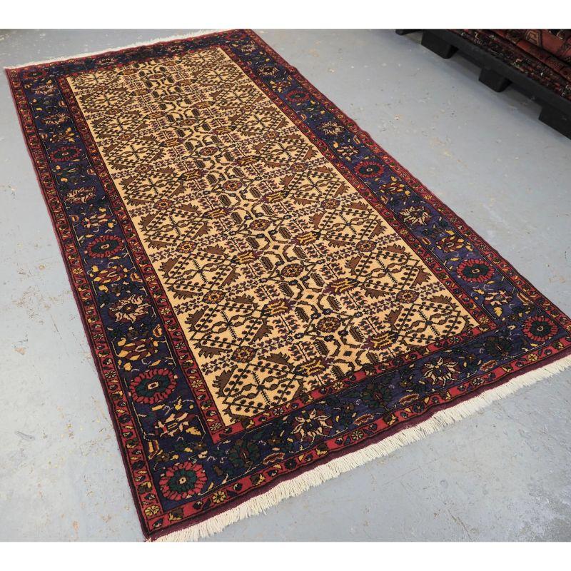 Antique Anatolian Kirsehir village prayer rug of small size and excellent design.

About 70 years old.

A good large size Turkish rug from the town of Oushak, the rug has the traditional 'lotto' design on a cream coloured ground, the blue border