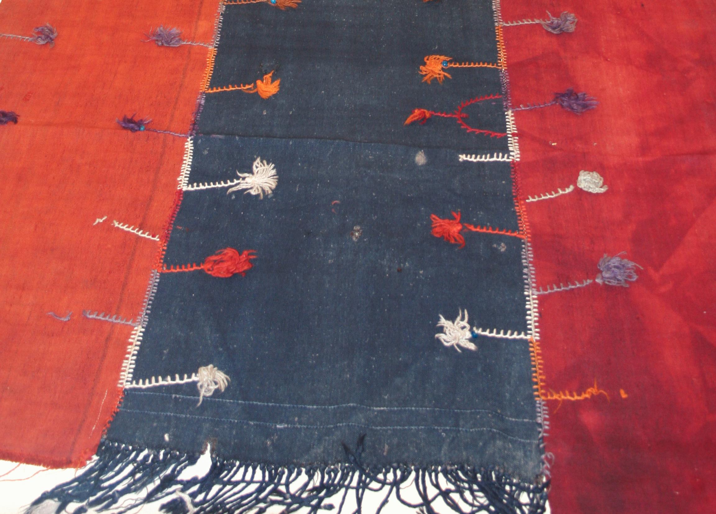 Perdehs were employed as tent dividers by the Kurdish tribes of eastern Anatolia, creating partitions inside their dwellings. Each flat-woven wool panel is individually dip-dyed with natural pigments, and subsequently hand-stitched to the other