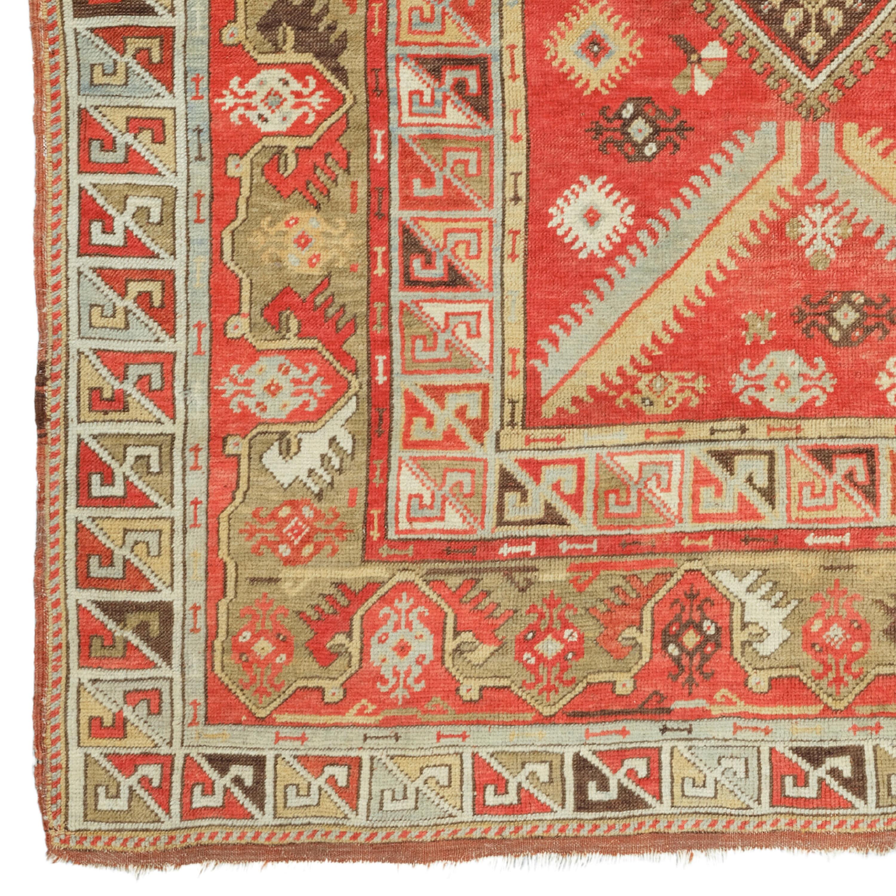 Antique Anatolian Rug - 19th Century Milas Rug

The Magnificence of the Historical Texture This antique Milas carpet is a work of art from the 19th century. The central diamond medallion and corner spandrels in contrasting colors on a rich red