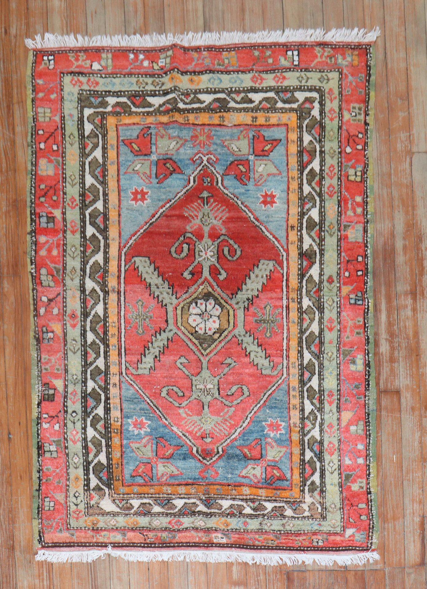 Quirky Antique Turkish Anatolian floral rug featuring vibrant colors.

Measures: 3'3'' x 4'10
