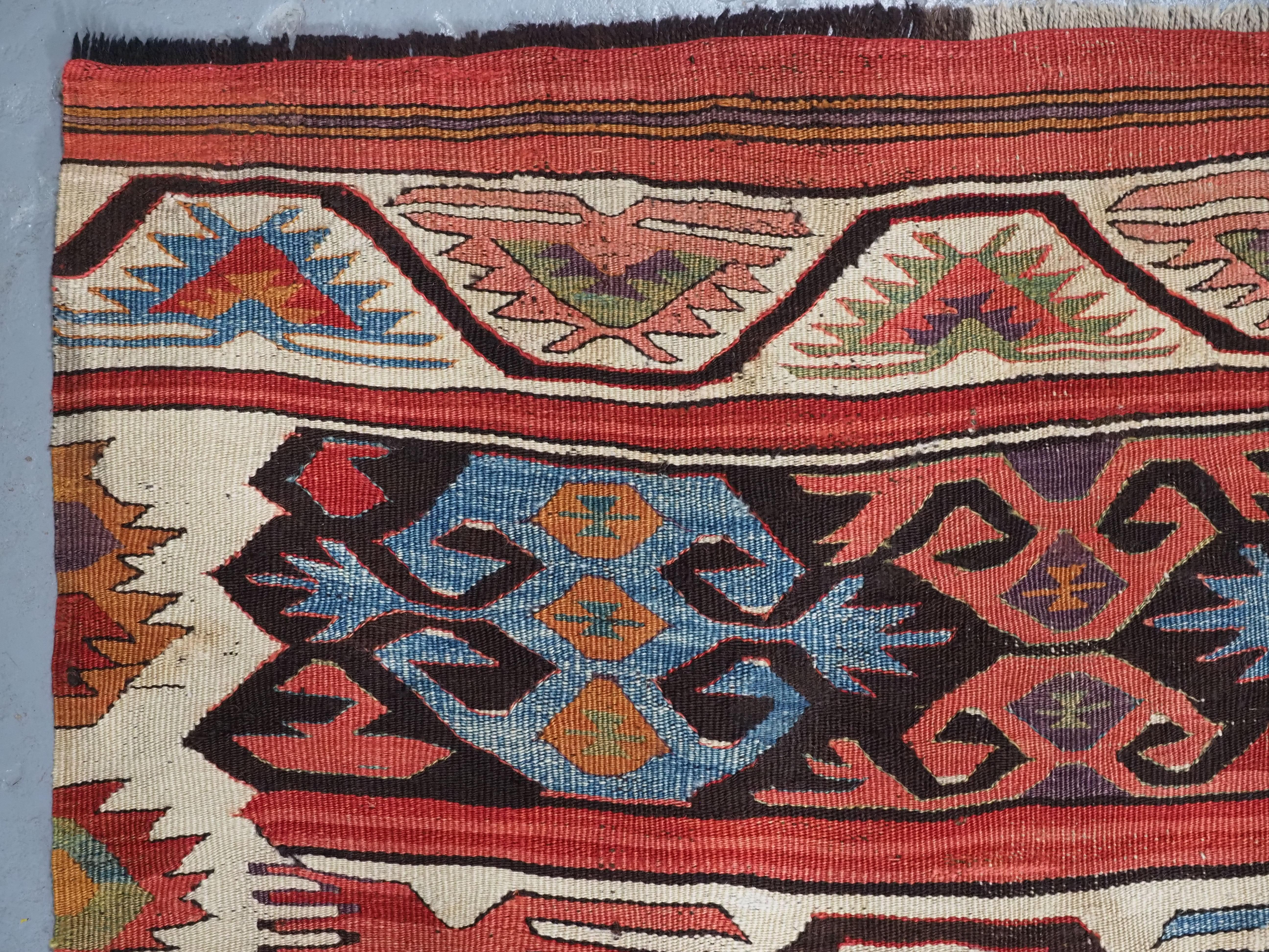 Wool Antique Anatolian village kilim from the Mut region of Turkey,  1880 or earlier. For Sale