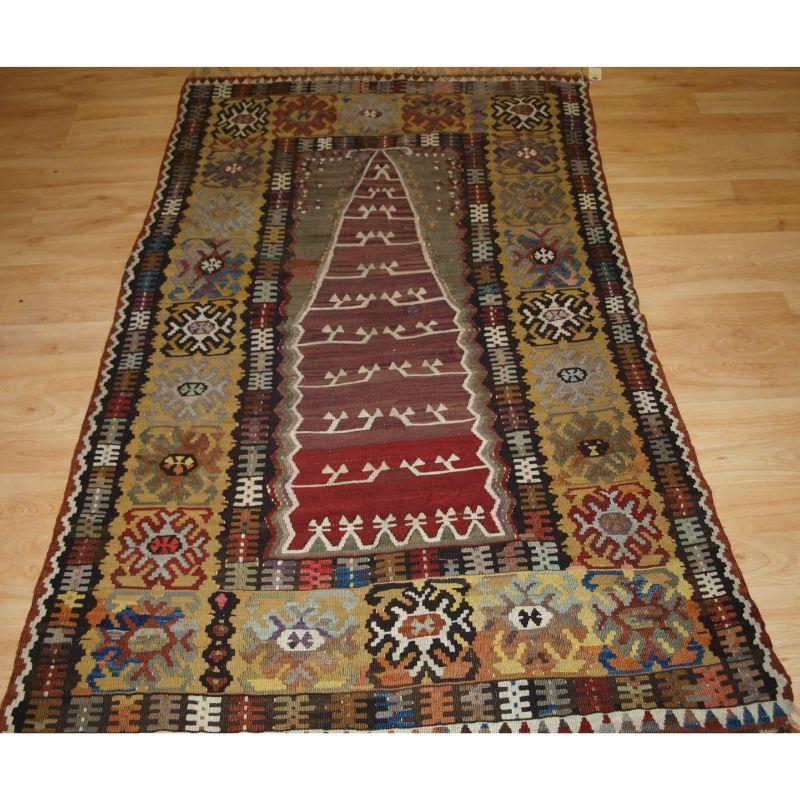 Antique Anatolian Yahyali prayer kilim.

A very good Turkish prayer kilim from the town of Yahyali, the design is unique to this town and has an almost abstract feel. This example has superb colour which compliments the design well.

Excellent