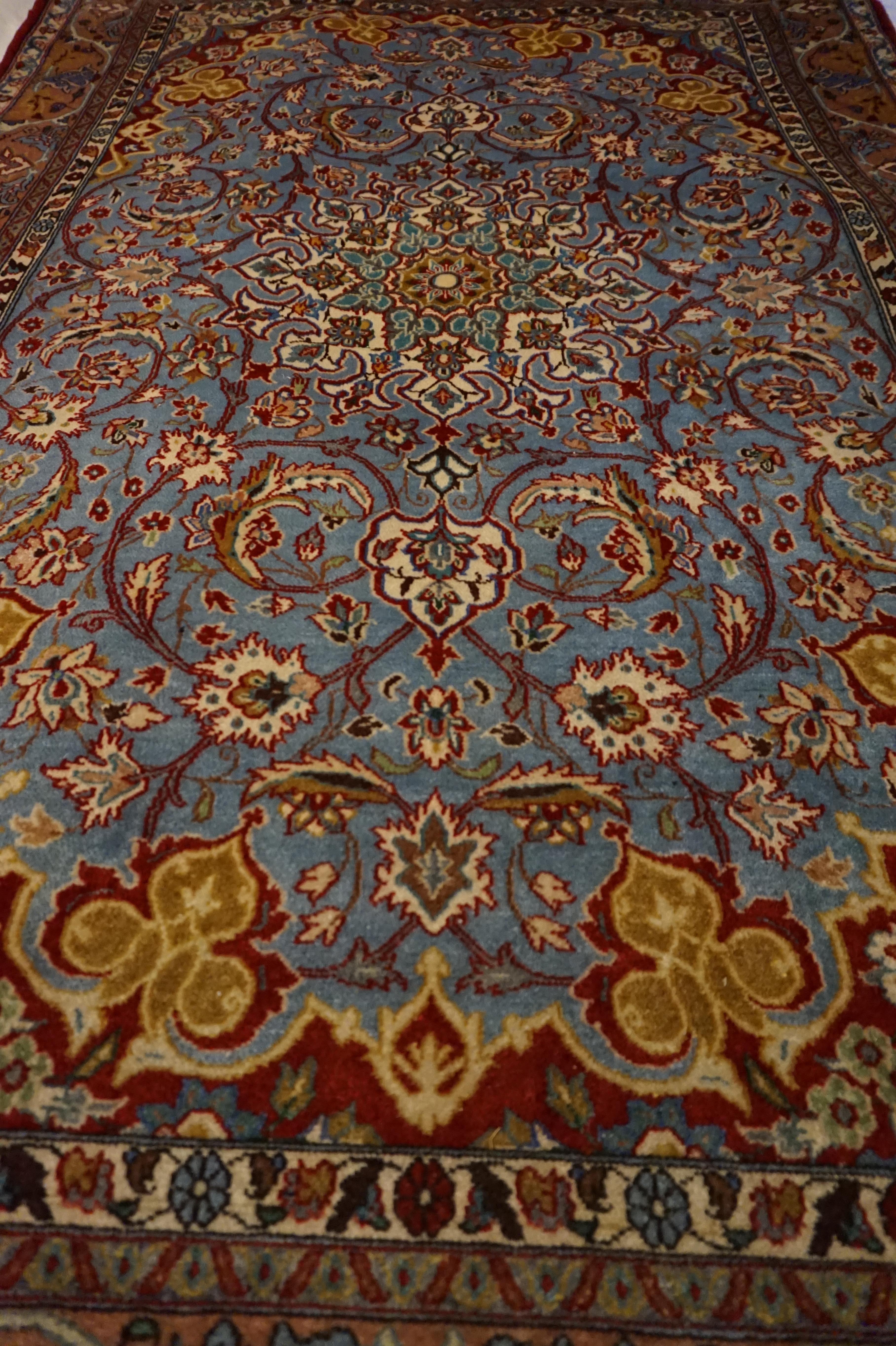 Indian Antique Ancient Isfahan Inspired Hand Knotted Rug With Scrolling Floral Theme For Sale