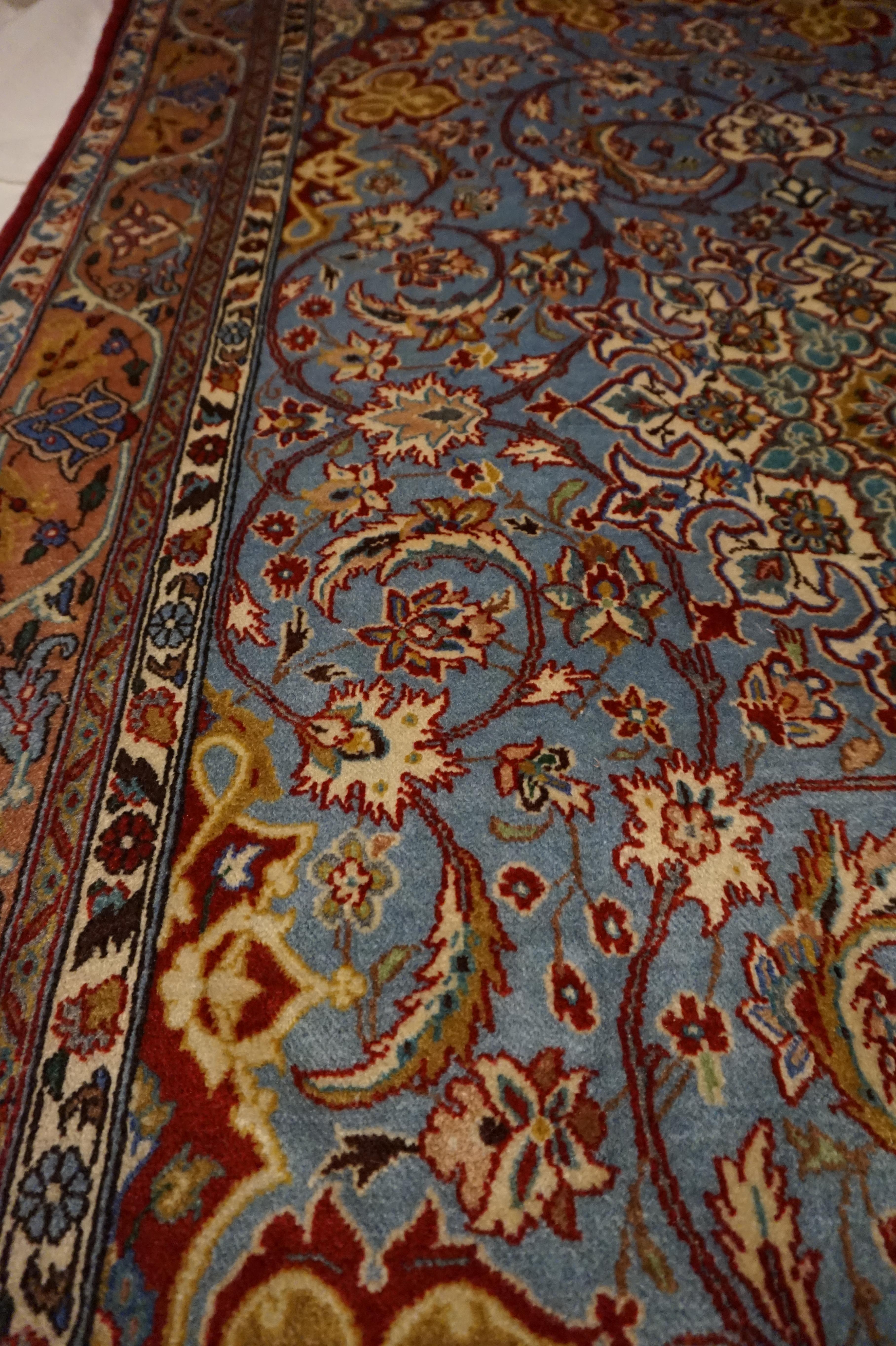 Mid-20th Century Antique Ancient Isfahan Inspired Hand Knotted Rug With Scrolling Floral Theme For Sale