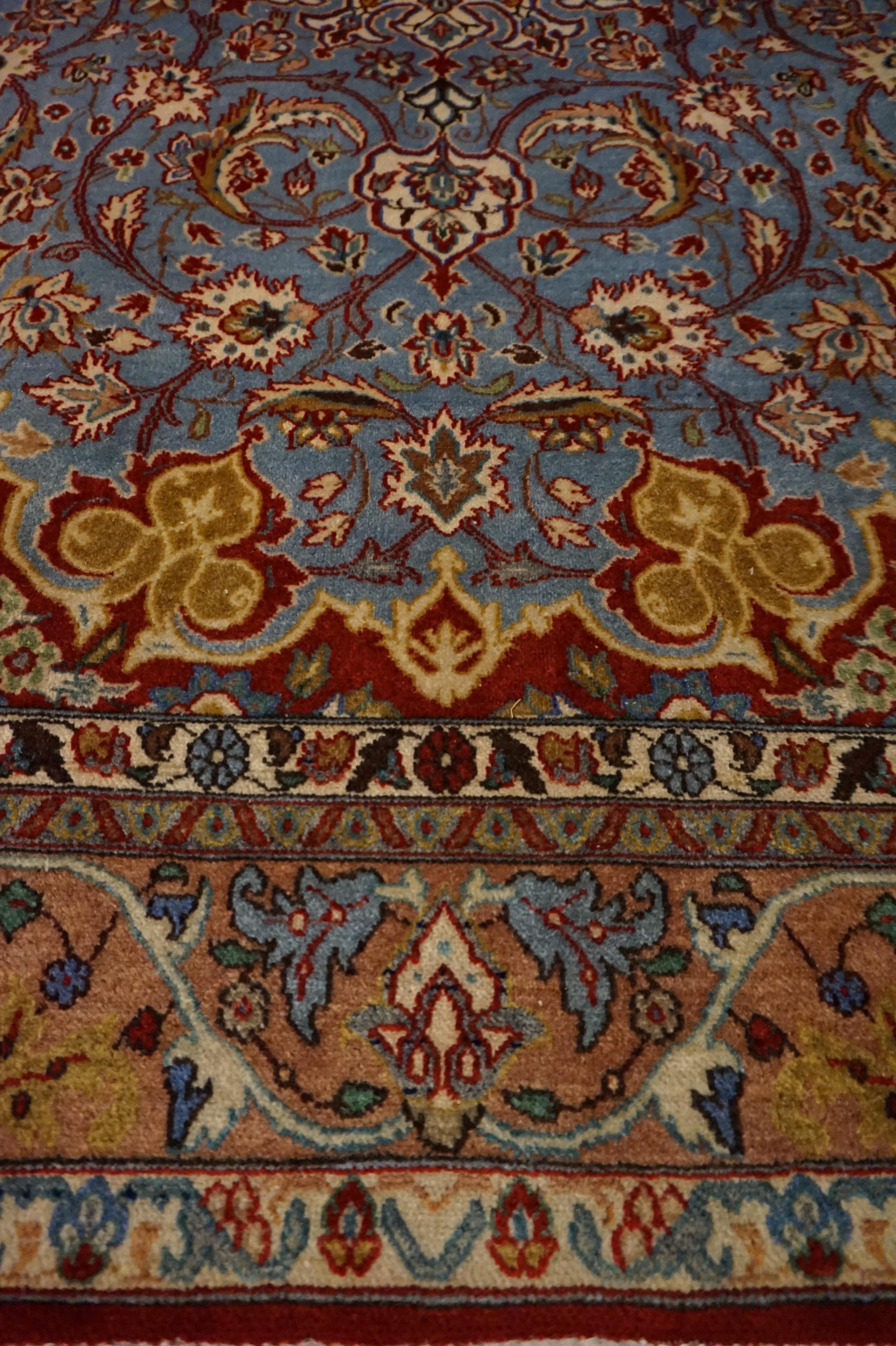 Wool Antique Ancient Isfahan Inspired Hand Knotted Rug With Scrolling Floral Theme For Sale