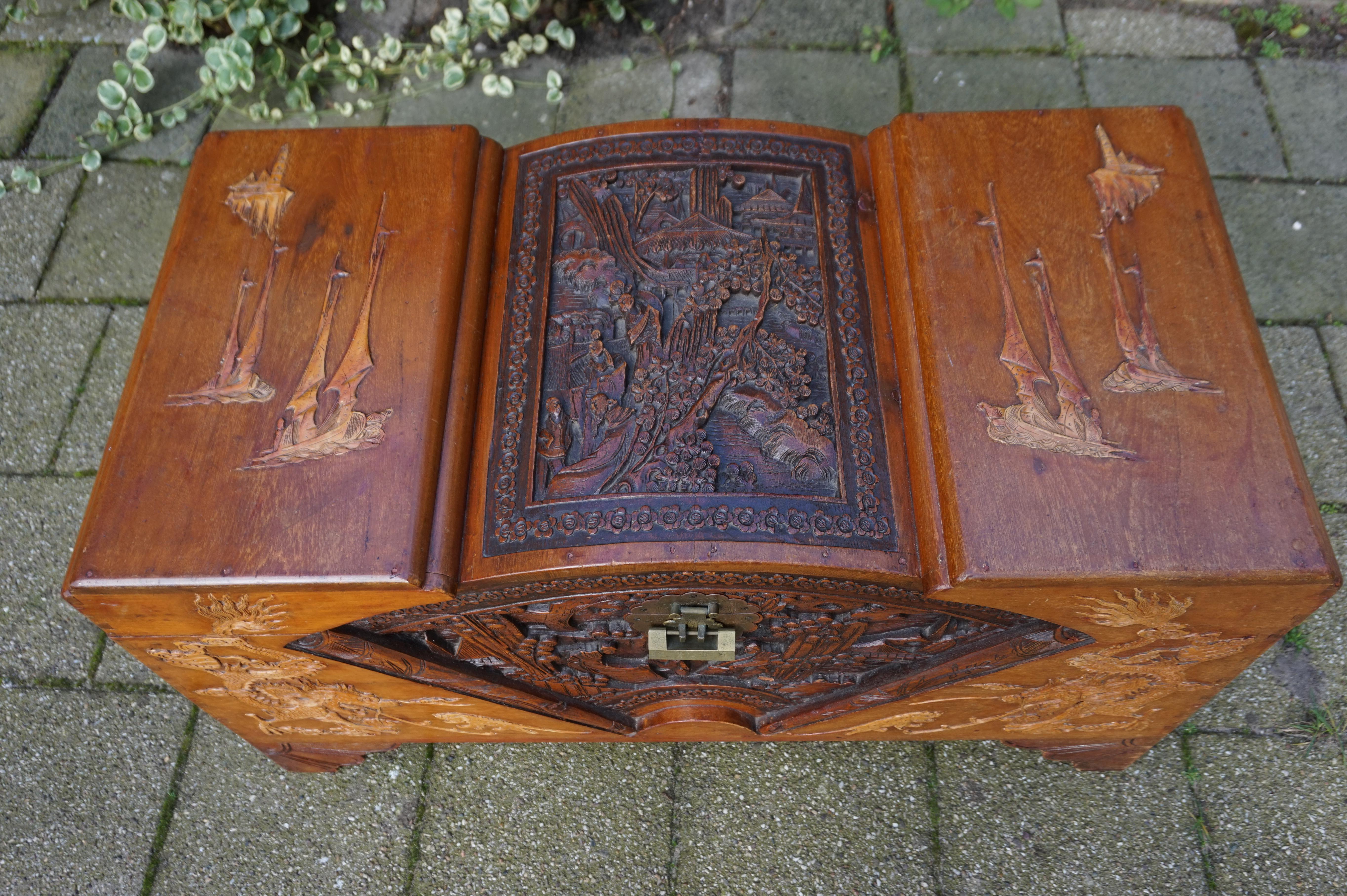 Early 20th century, richly carved Chinese Trunk with decorations all around.

If you are looking for a decorative and useful piece of furniture with a distinct Asian design then this all handcrafted Chinese 'blanket chest' could be perfect. By the