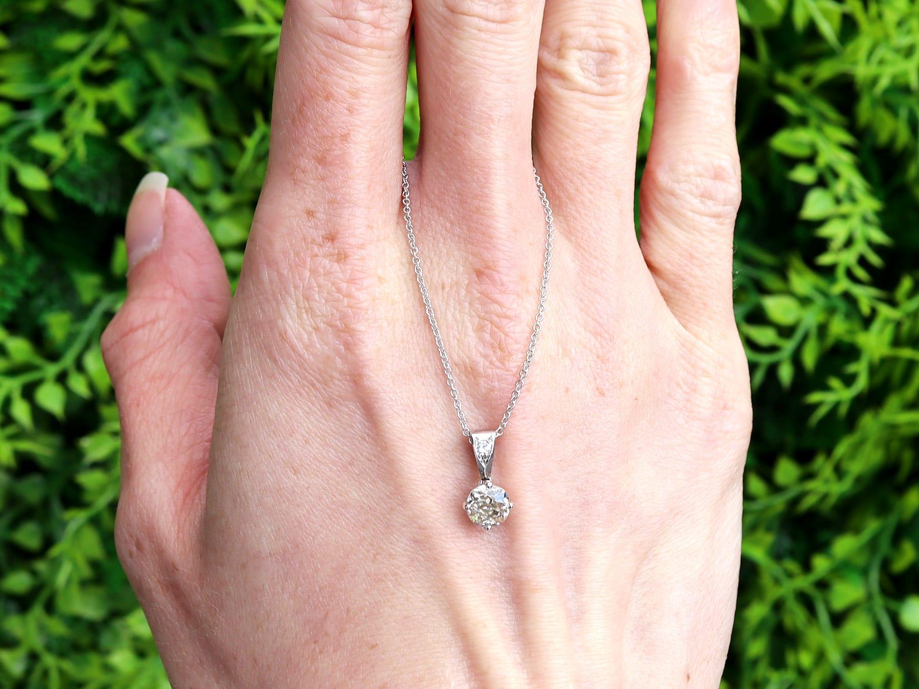 A fine and impressive antique 0.70 carat diamond and contemporary 18 karat white gold pendant; part of our diverse diamond jewellery collections.

This fine and impressive French solitaire pendant has been crafted in 18k white gold.

The pierced