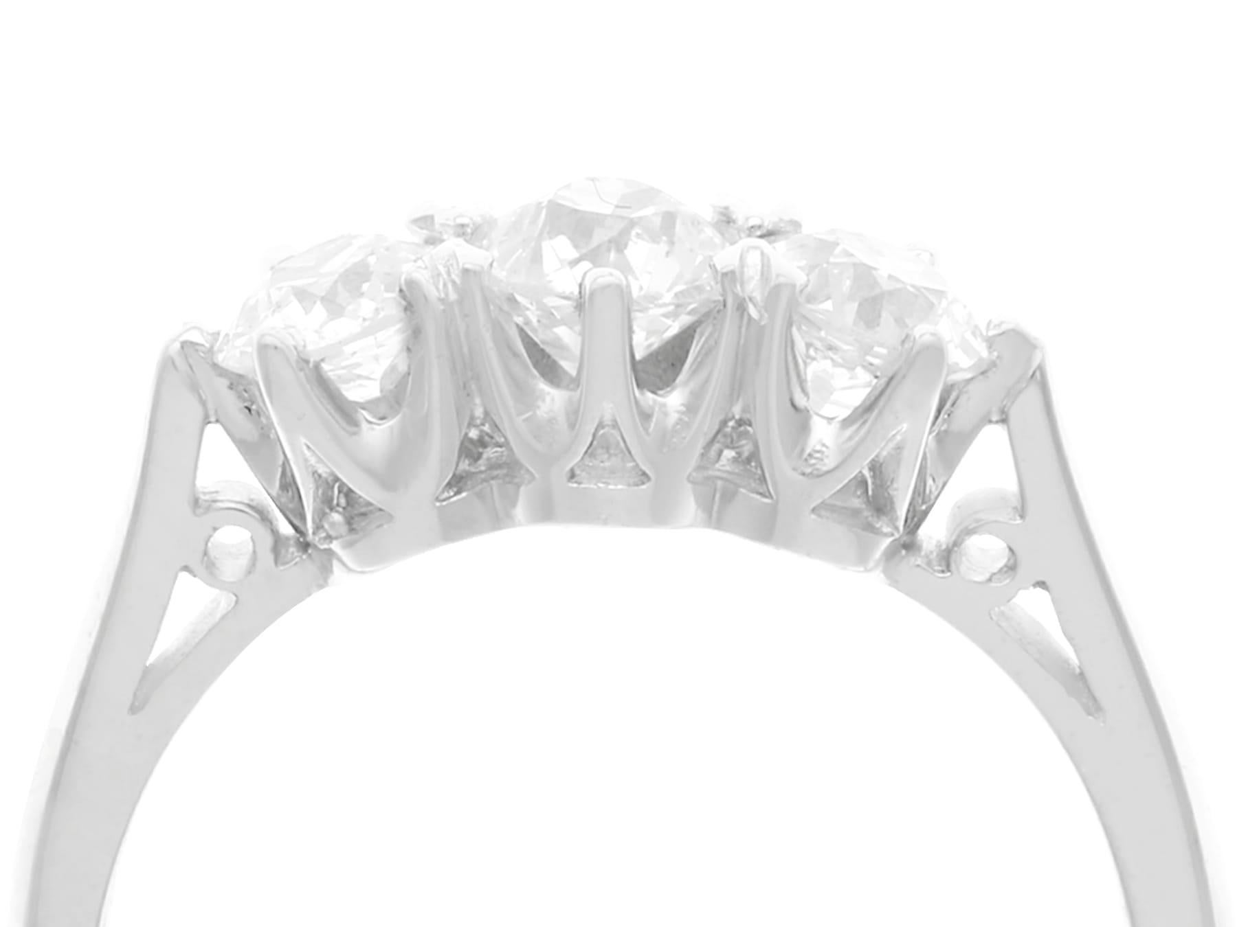 Round Cut Antique and Contemporary 1.32 Carat Diamond Platinum Three-Stone Ring For Sale