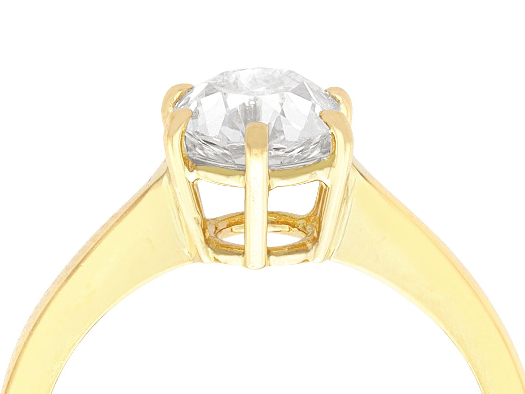 A stunning, fine, and impressive 1.38 Carat diamond and 18 karat yellow gold solitaire ring; part of our diverse collection of Victorian jewelry and estate jewelry.

This stunning gold solitaire ring has been crafted in 18k yellow gold.

The plain
