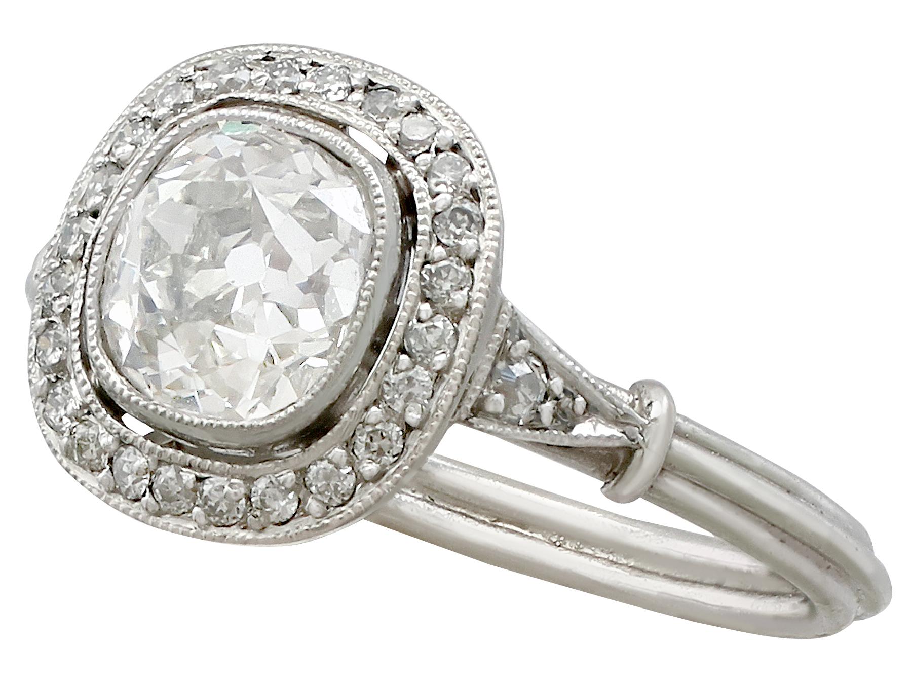 Women's or Men's Antique and Contemporary 1.48 Carat Diamond and Platinum Halo Ring