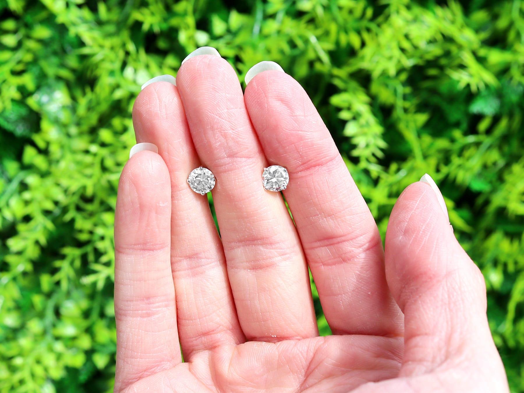 A stunning, fine and impressive pair of antique 1.51 carat diamond and 18 karat white gold stud earrings; part of our diverse vintage jewellery and diamond earrings collections.

These stunning, fine and impressive vintage diamond earrings have been