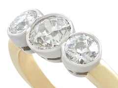 Antique and Contemporary 1.69 Carat Diamond and Yellow Gold Trilogy Ring