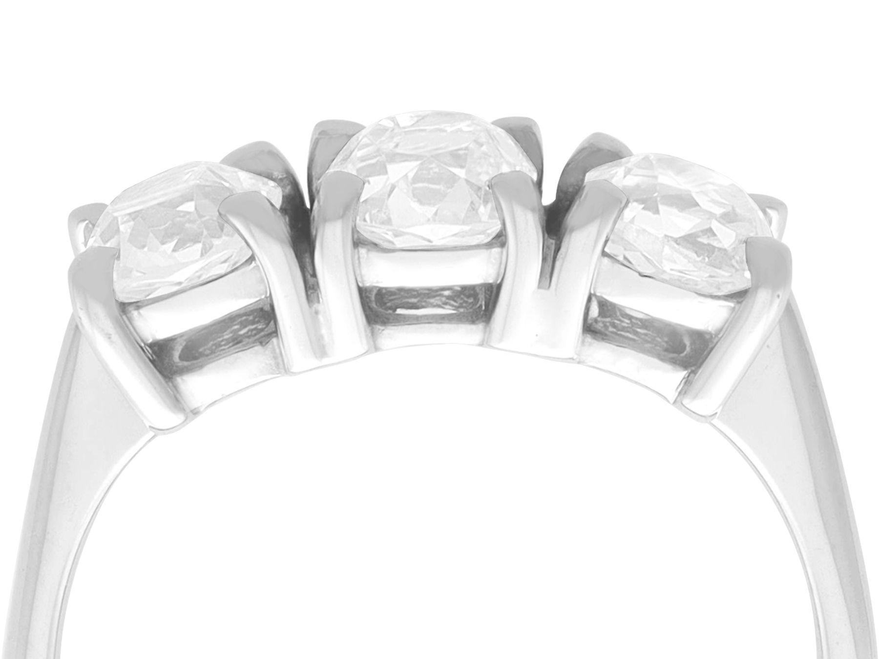 A stunning, fine and impressive 1.73 carat diamond and 18 karat white gold trilogy ring; part of our diverse diamond jewellery and estate jewelry collections.

This impressive trilogy diamond ring has been crafted in 18k white gold.

The