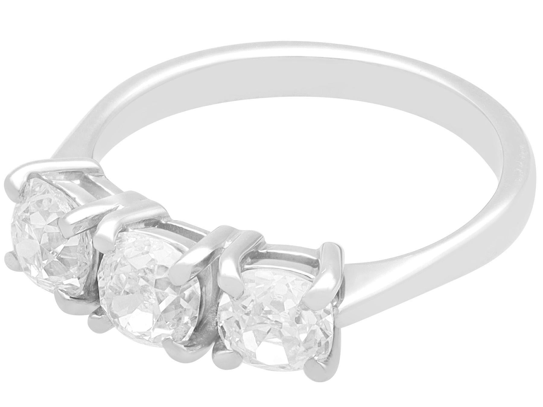 Round Cut Antique and Contemporary 1.73 Carat Diamond and 18k White Gold Trilogy Ring For Sale