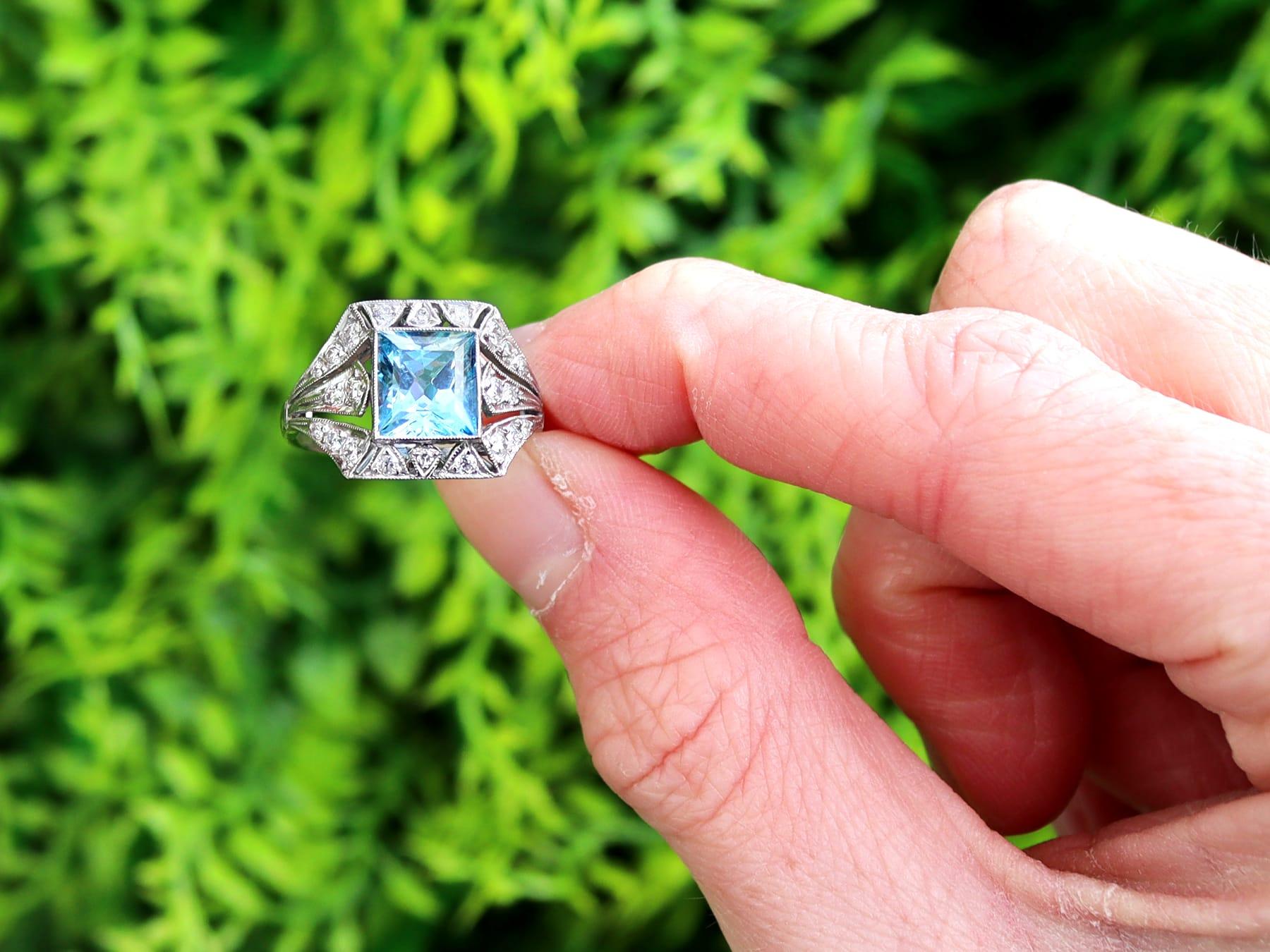 A stunning, fine and impressive 1.81 carat aquamarine, 0.50 carat diamond and platinum dress ring; part of our diverse aquamarine jewelry and estate jewelry collections.

This stunning, fine and impressive aquamarine ring has been crafted in